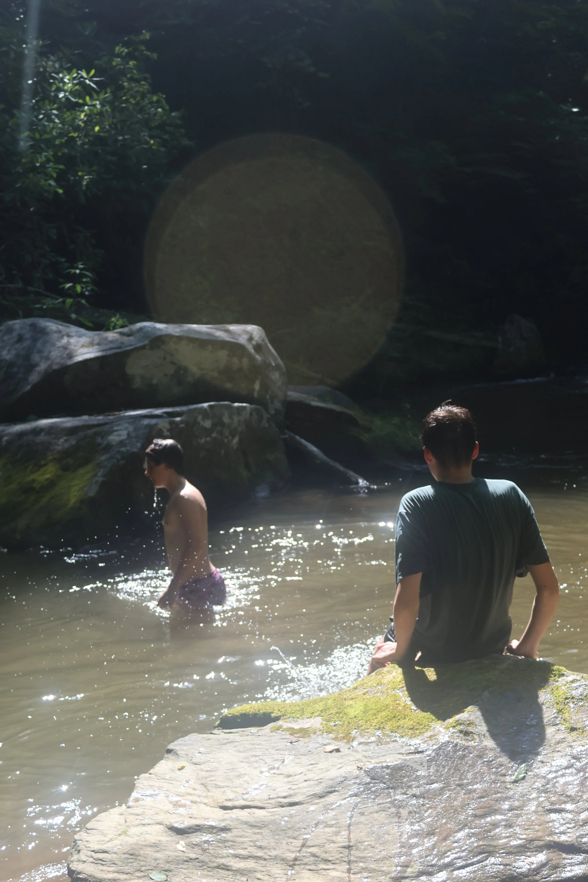 Sleepaway Campers in Nc explore the creek at Camp Arrowhead. 