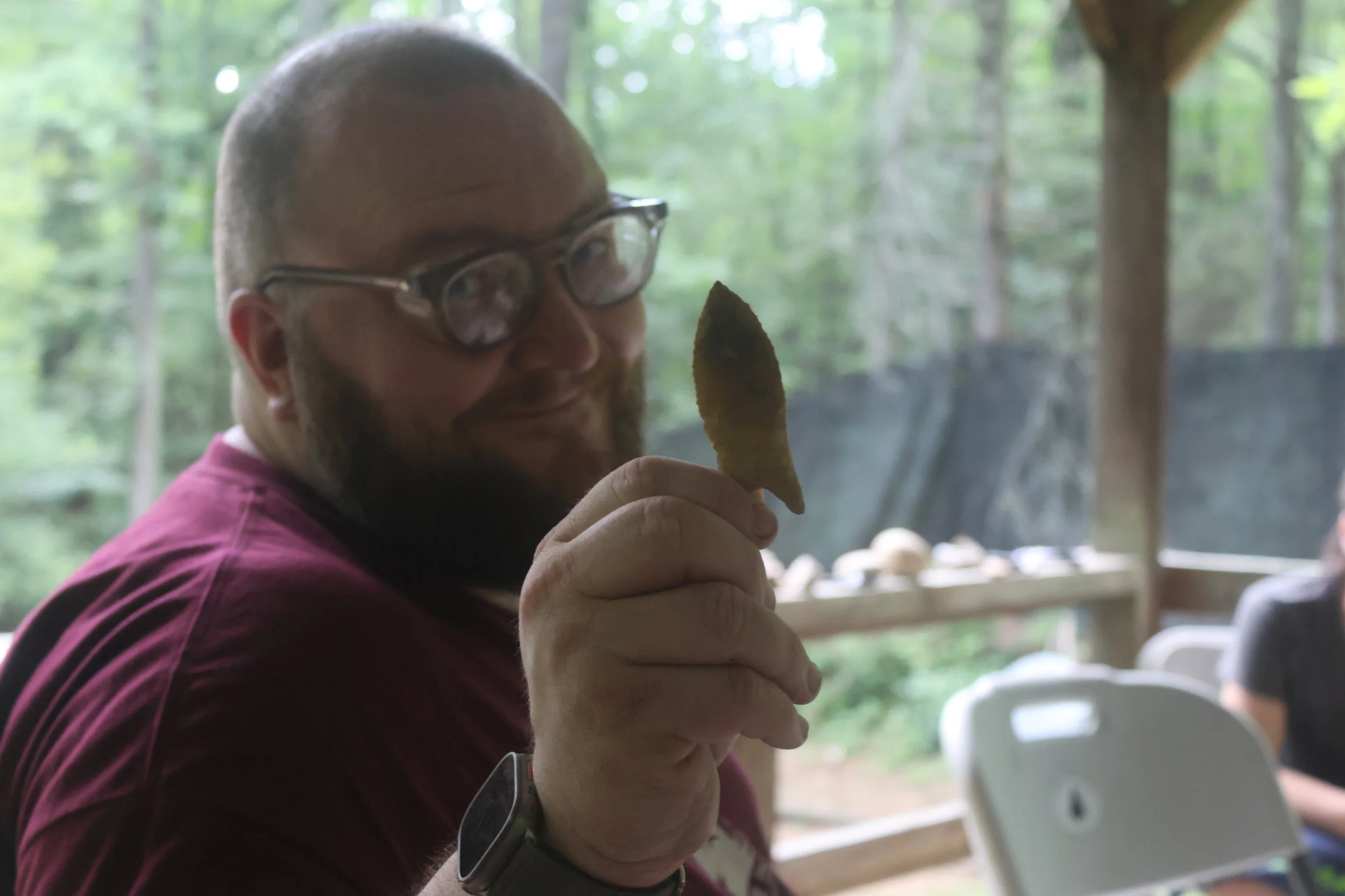 Experienced instructor at camp Arrowhead flint knapping. 