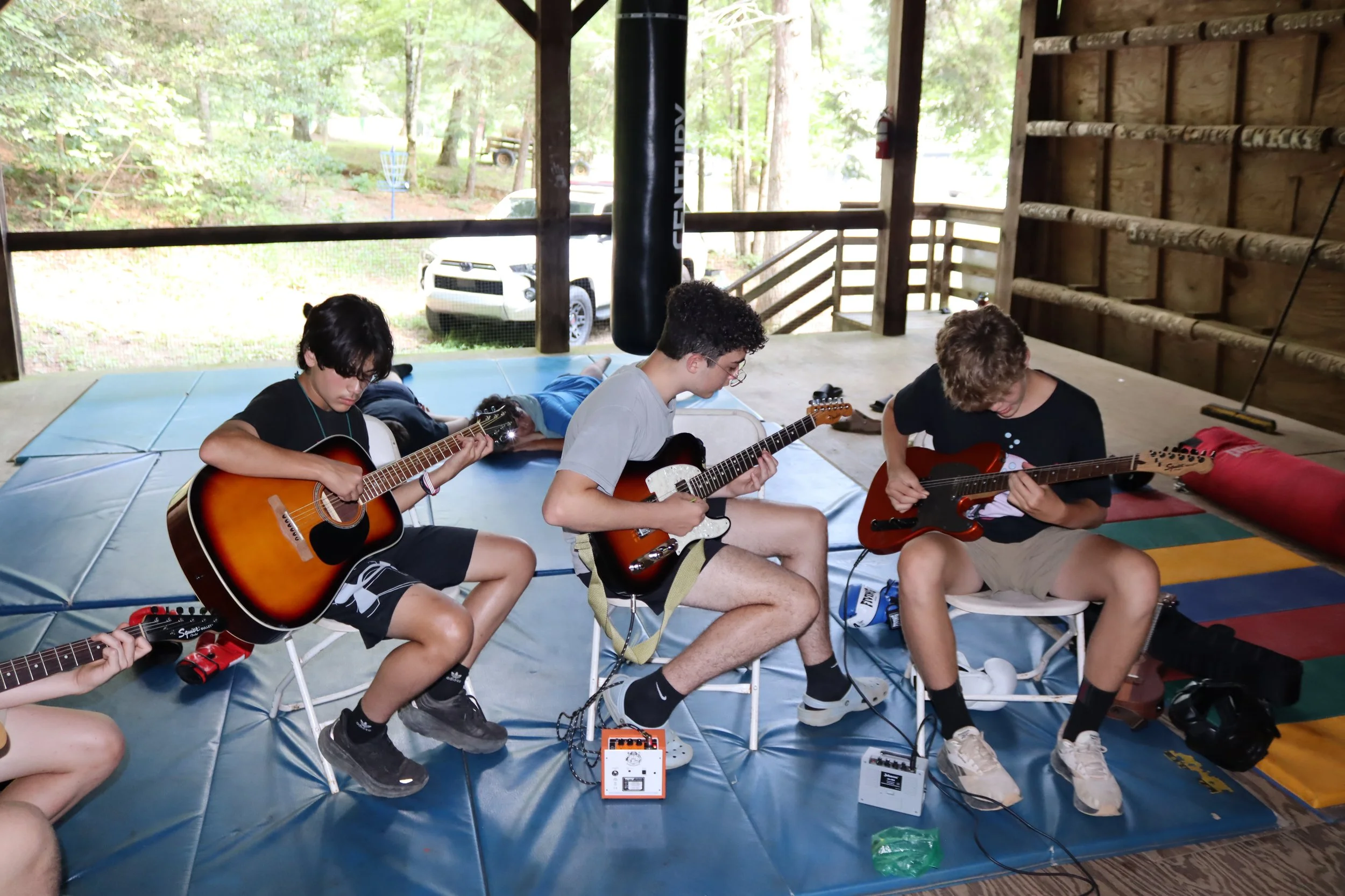 Group of overnight campers in music class at Camp Arrowhead in North Carolina. 