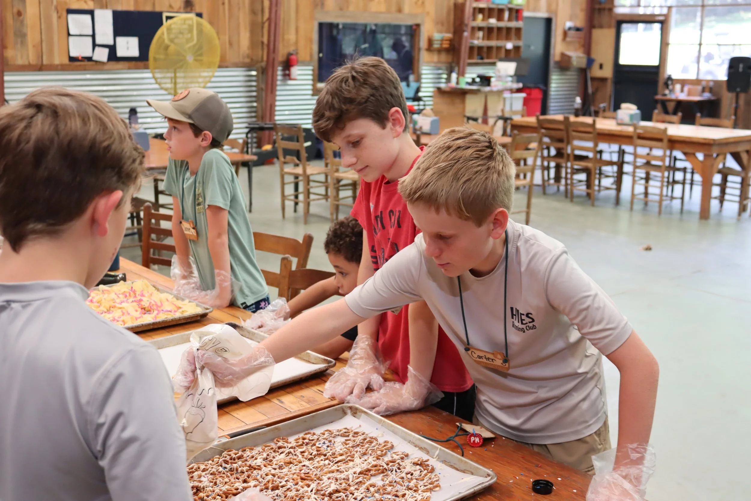 Overnight campers learn to make a tasty snack in cooking at Camp Arrowhead for boys in North Carolina. 