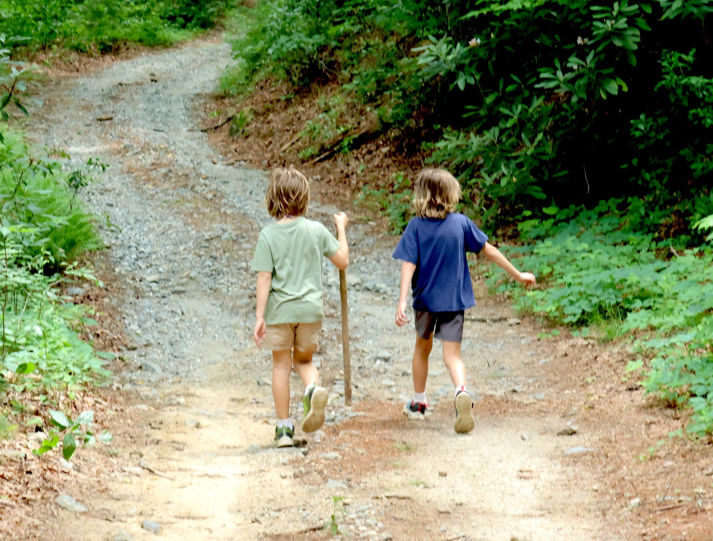 Camp Arrowhead brothers walking to activities together at camp.