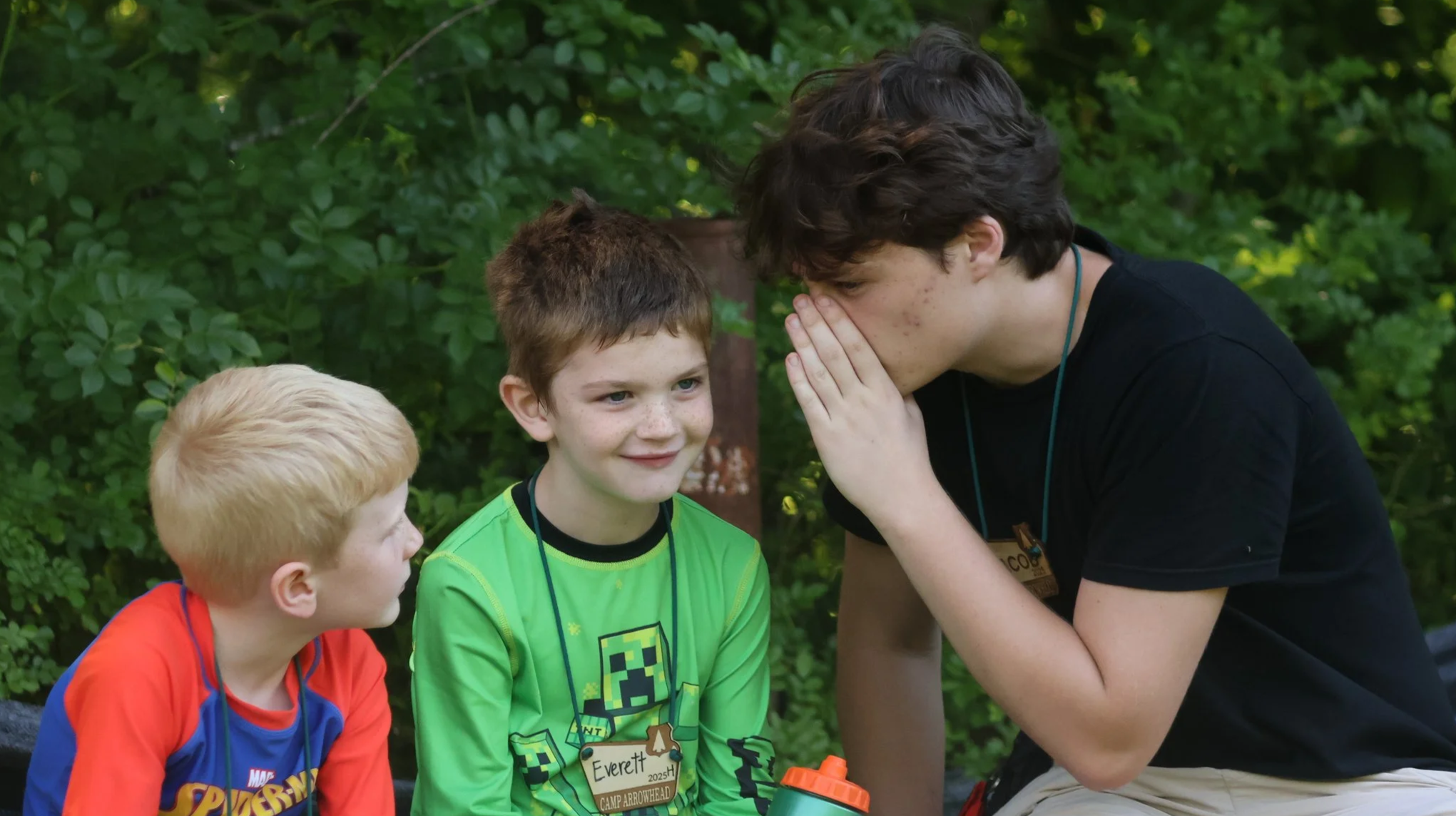 An Arrowhead Counselor having fun with the boys in his cabin.
