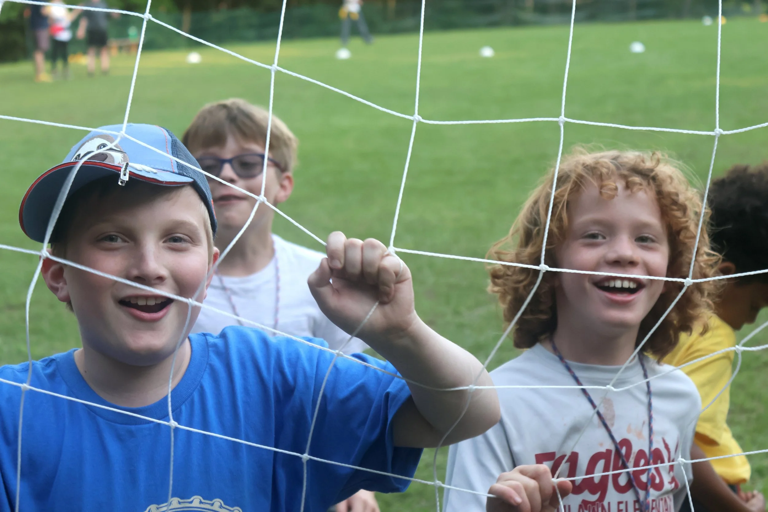 Camp Arrowhead Campers have fun on the sports field at summer camp