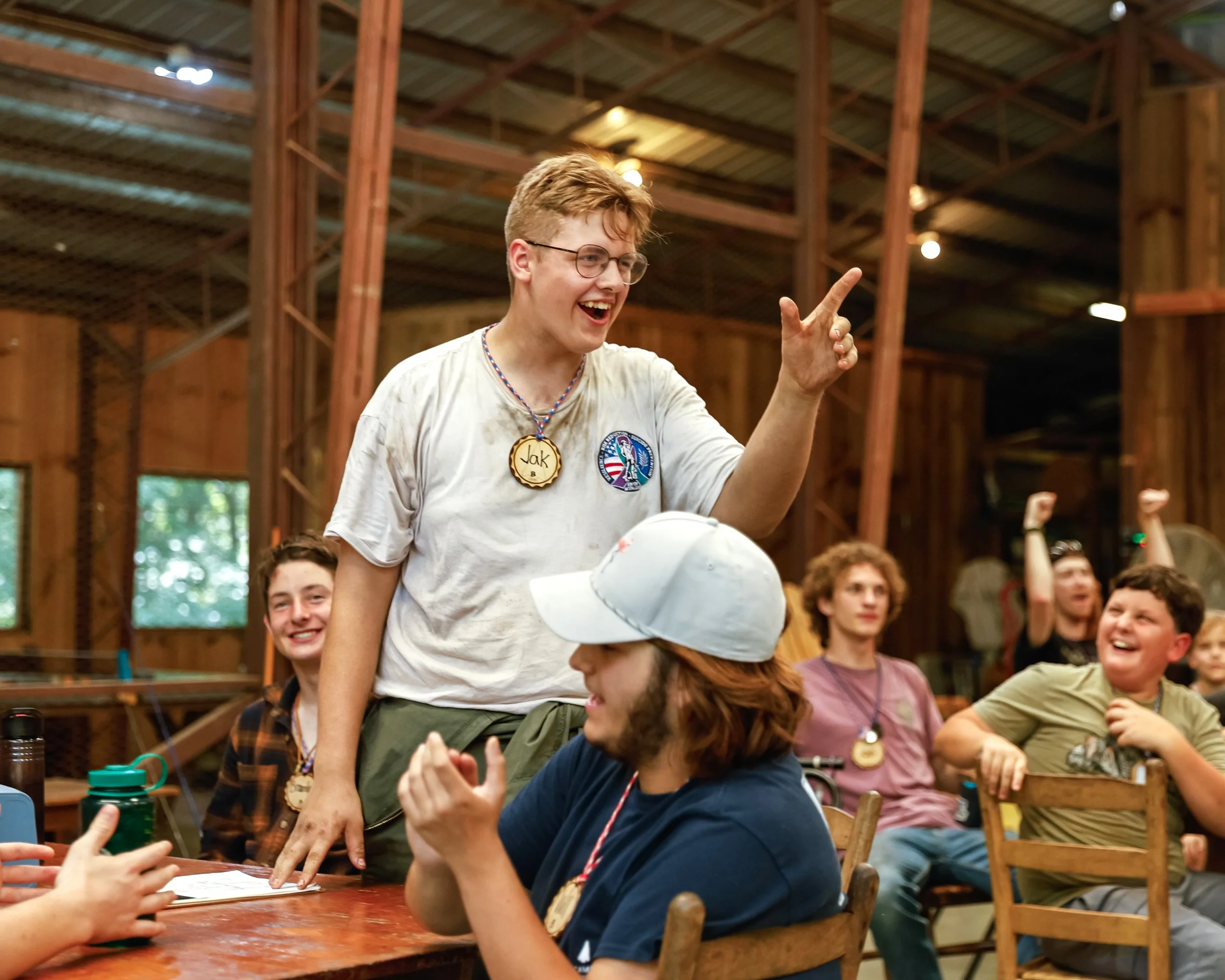 Camp Arrowhead Camper having fun in the camp dining hall