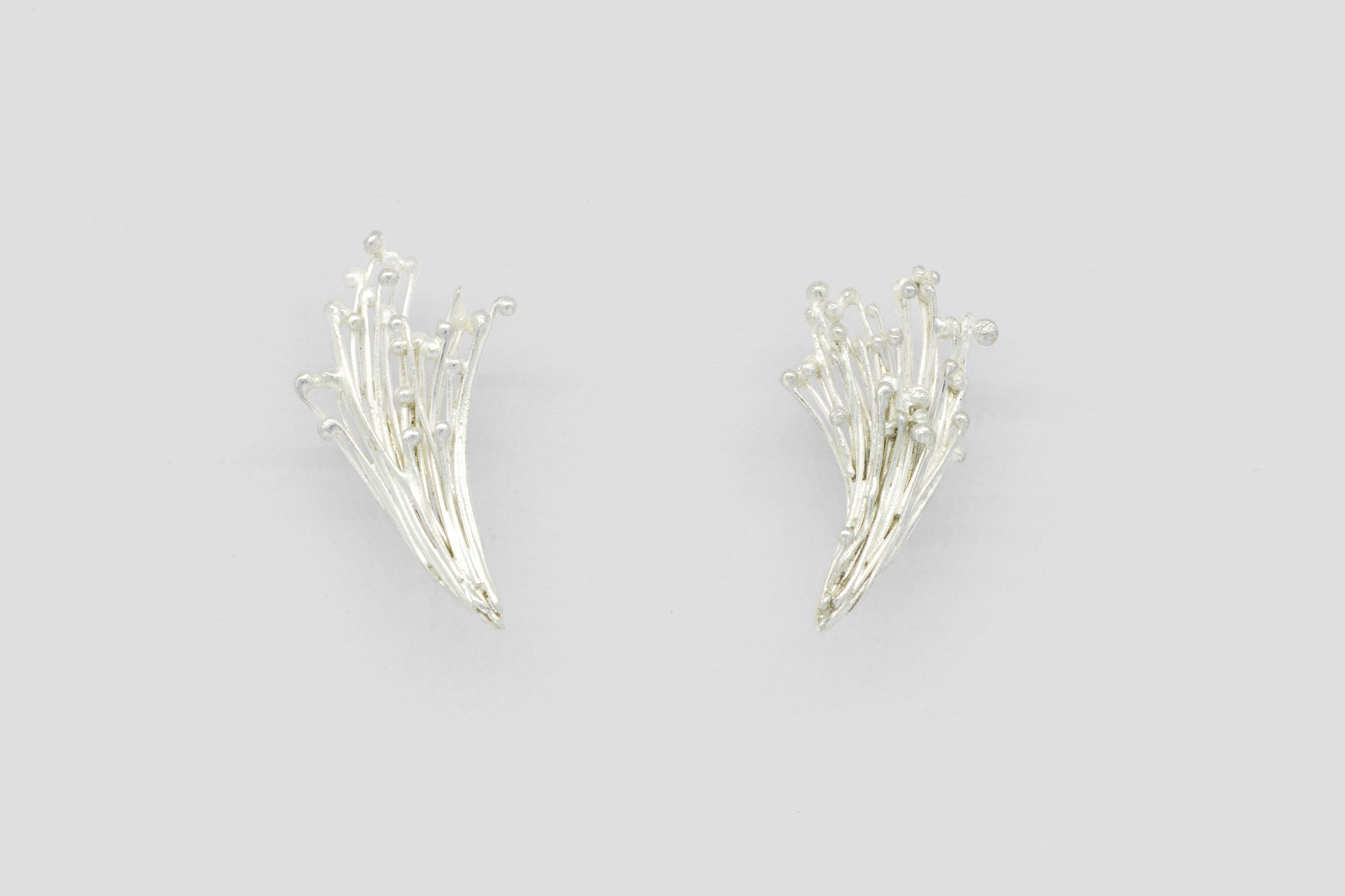 Comet Earrings_Front.jpg