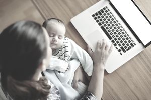 Multi-tasking-mom-baby-GettyImages-542734641-587a56233df78c17b66e5dae.jpg