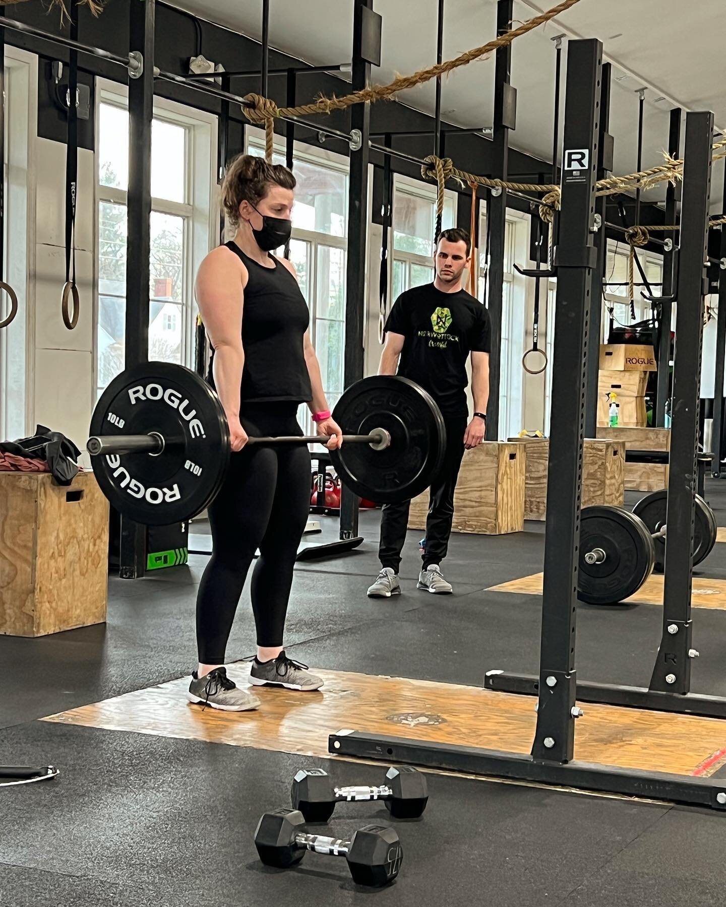 Coach Nik observing Leah during Monday nights deadlift conditioning workout. 

@nikolai.wright started his coaching journey with us last year. Despite working out at 530a most days he often will be found coaching 530PM