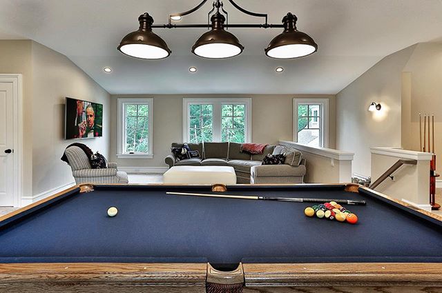 Anybody recognize the movie playing in the back of this lounge room we built? #gameroom #mancave #loungeroom #poolshark