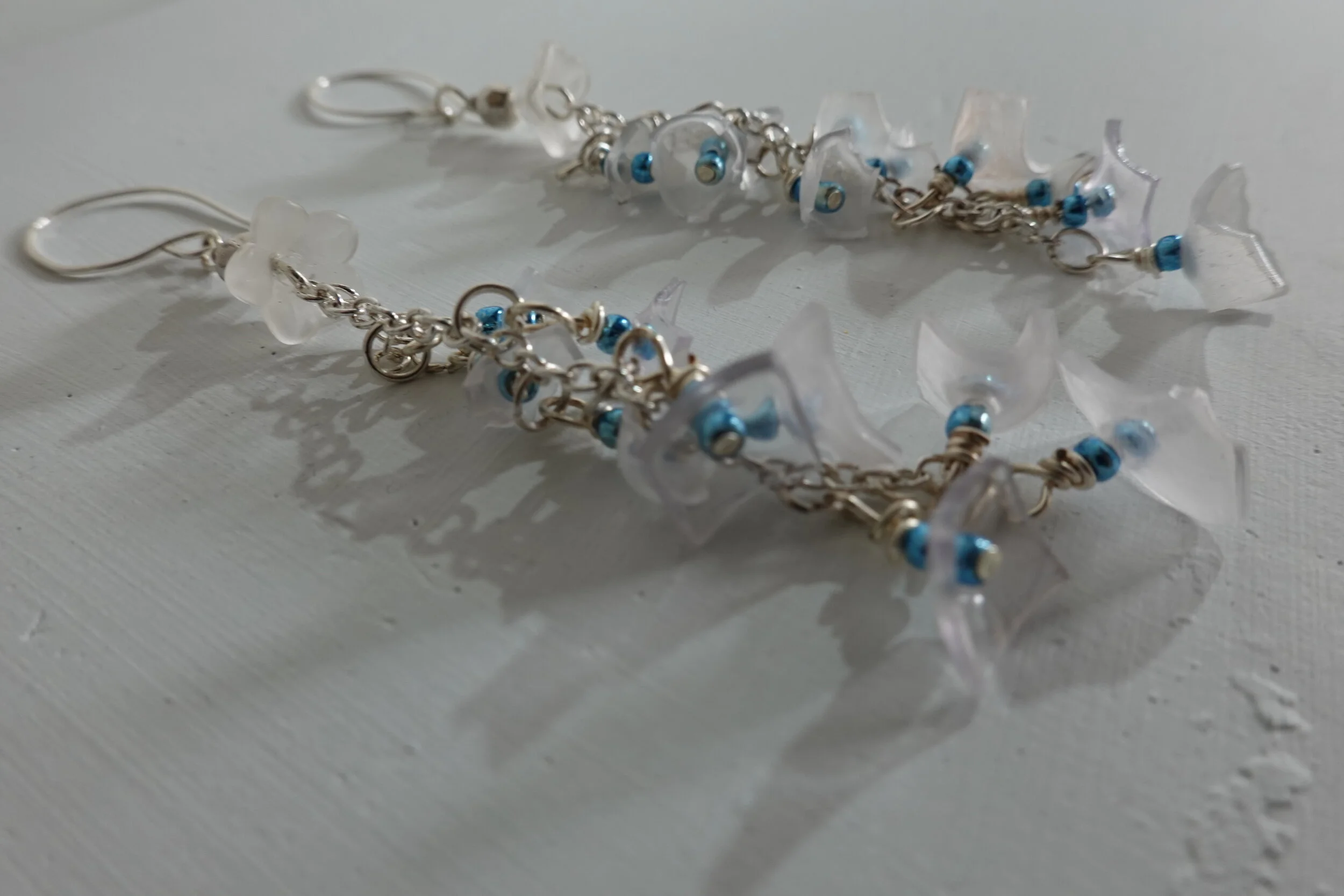 White Dancing Trumpet Flower Earrings