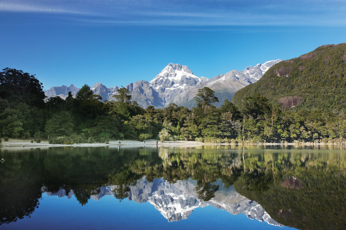 Mt Madeline reflected on Lake Alabaster (image courtesy of Ngai Tahu Tourism).