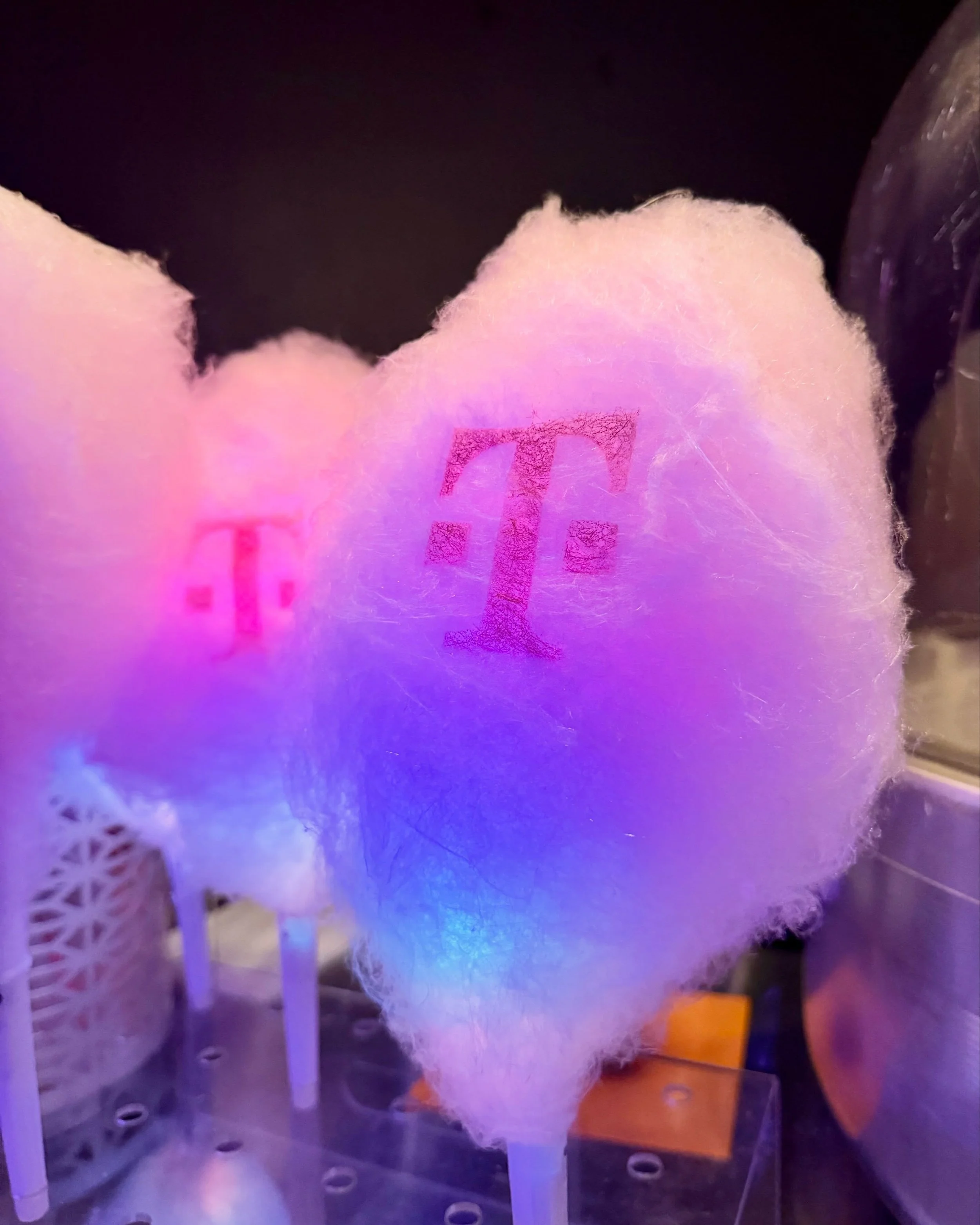 T-Mobile wanted to make a statement at their party at Brooklyn Bowl, so we spun fresh cotton candy on LED glow sticks and stamped every single one with their logo.
The result? A branded treat guests couldn&rsquo;t stop talking about, photographing, a