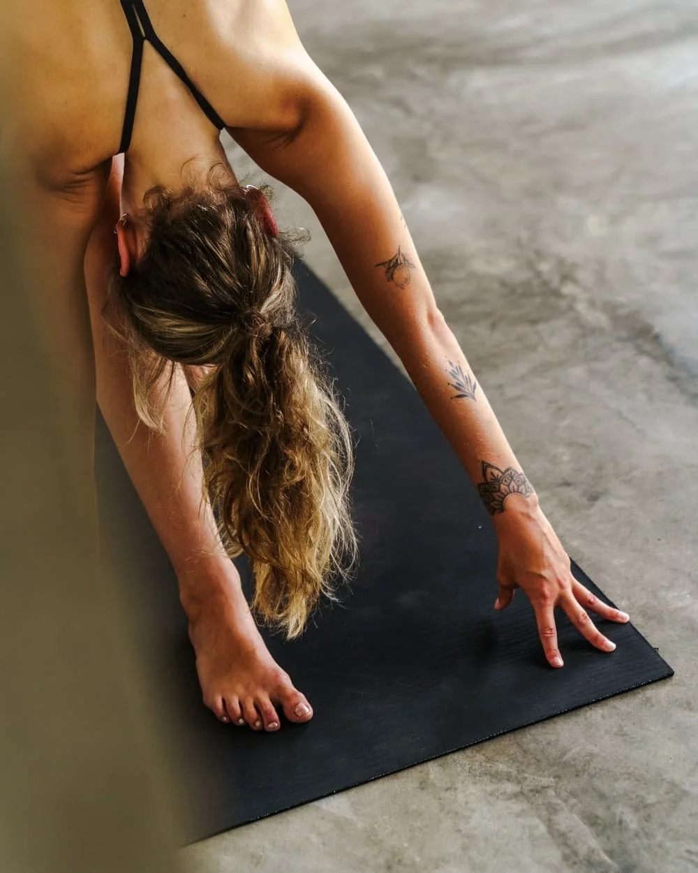 Guest practising yoga during our surf and yoga retreats at Layback in Sri Lanka
