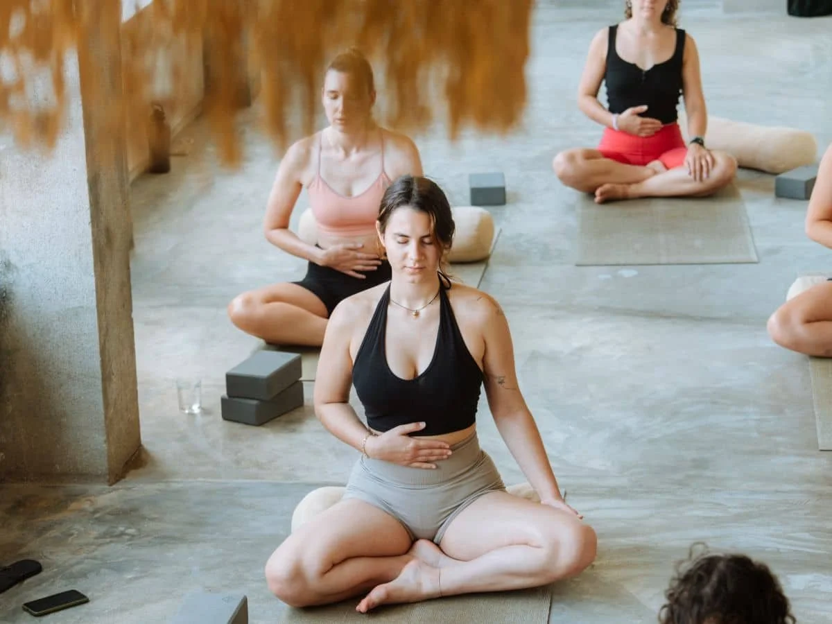Guests practising yoga during the Standard package at Layback