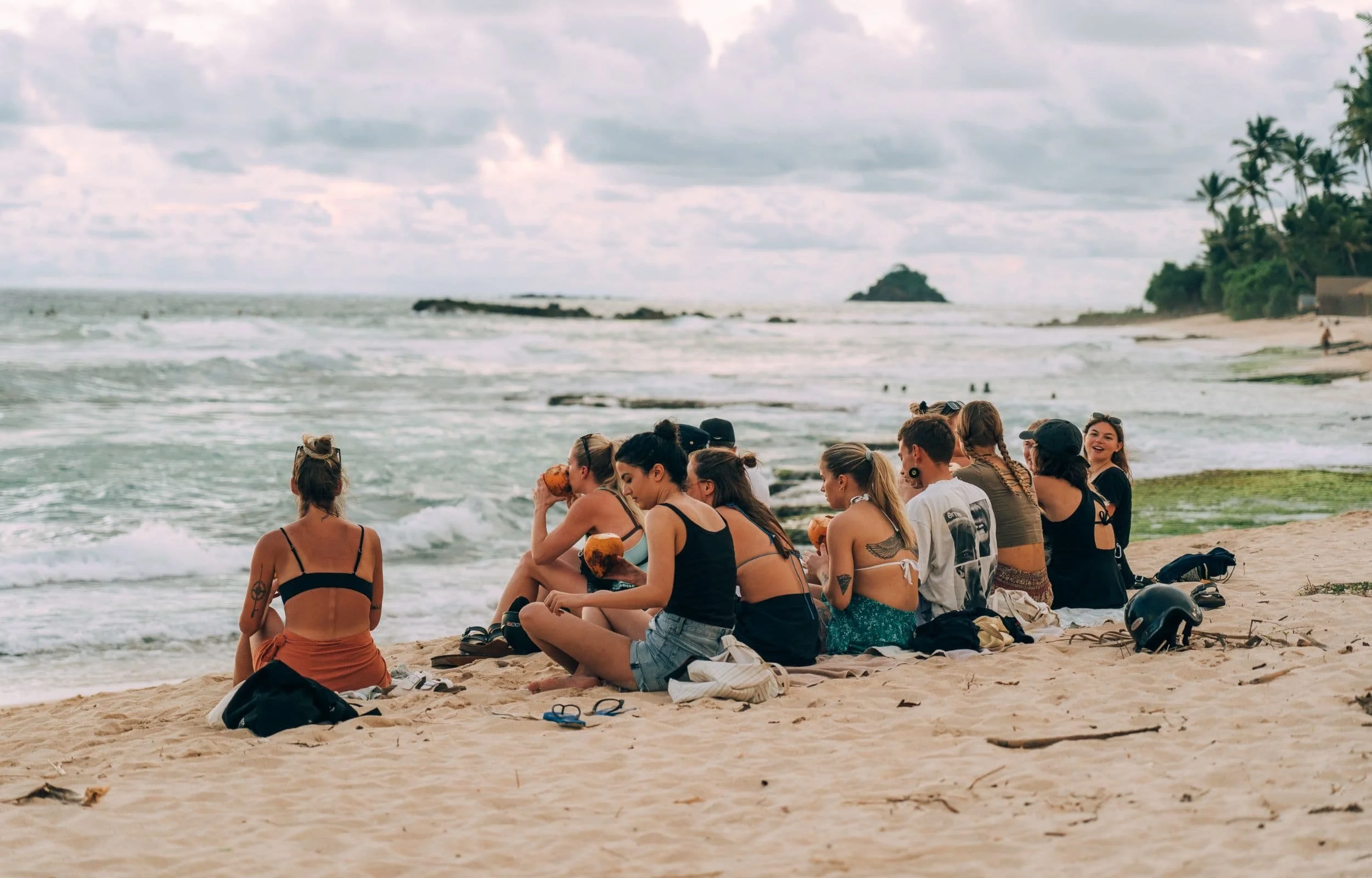 Layback guests surfing and enjoying camp life in Weligama, Sri Lanka