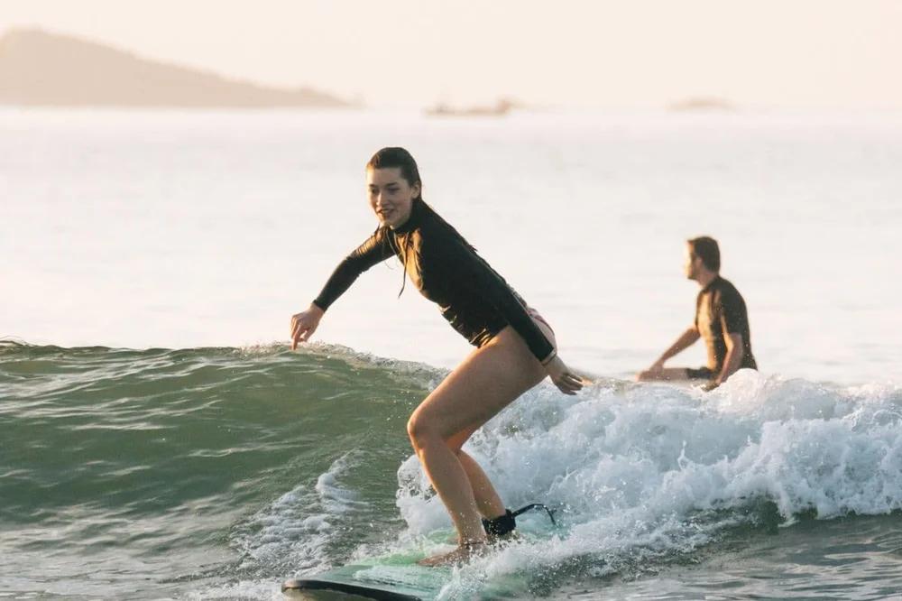 Guest paddling for and catching a wave independently