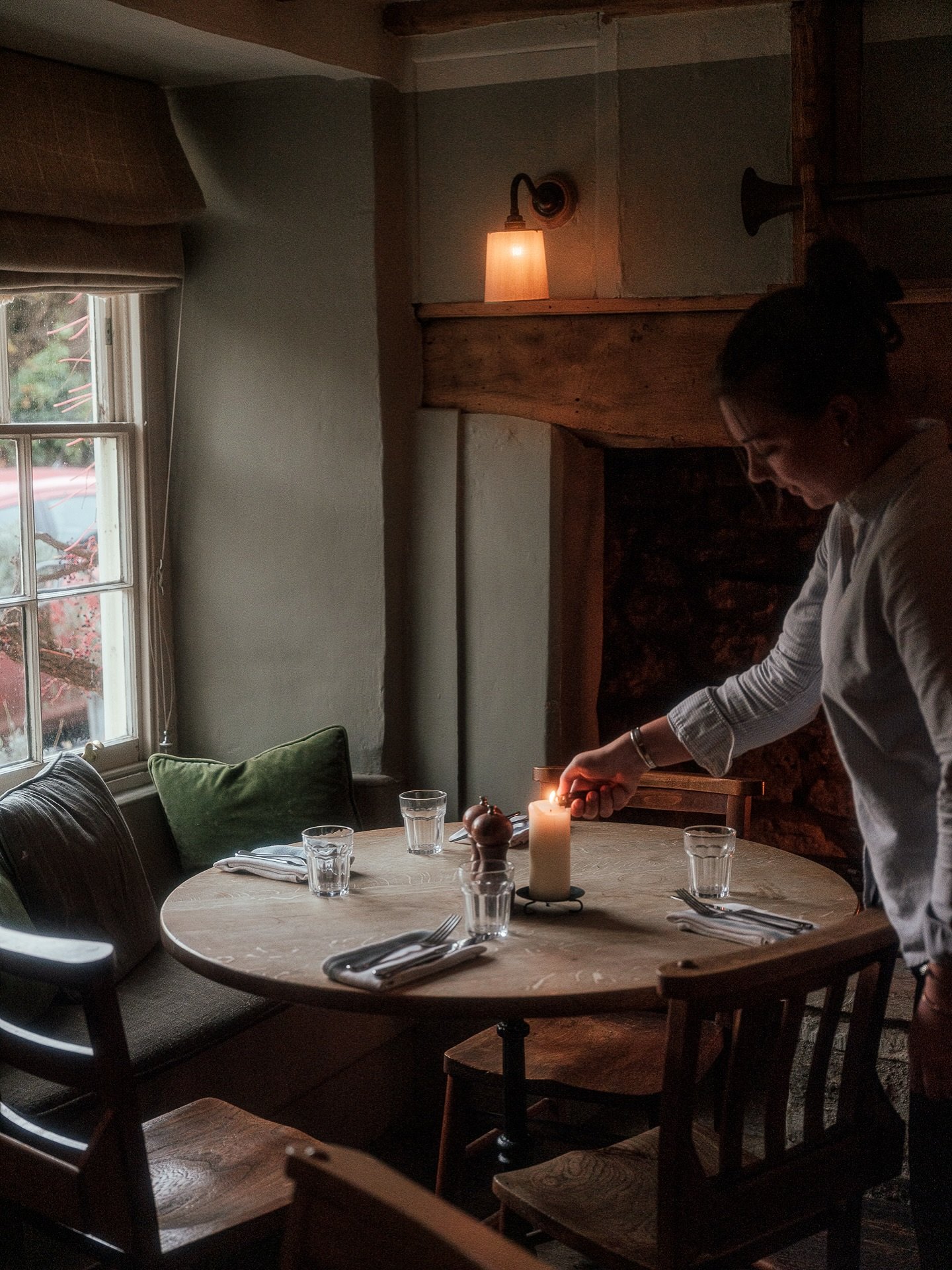 The daily ritual of setting the restaurant for the day ahead, lighting the fires, and making sure the pub is feeling cozy, we&rsquo;re open from 12pm.