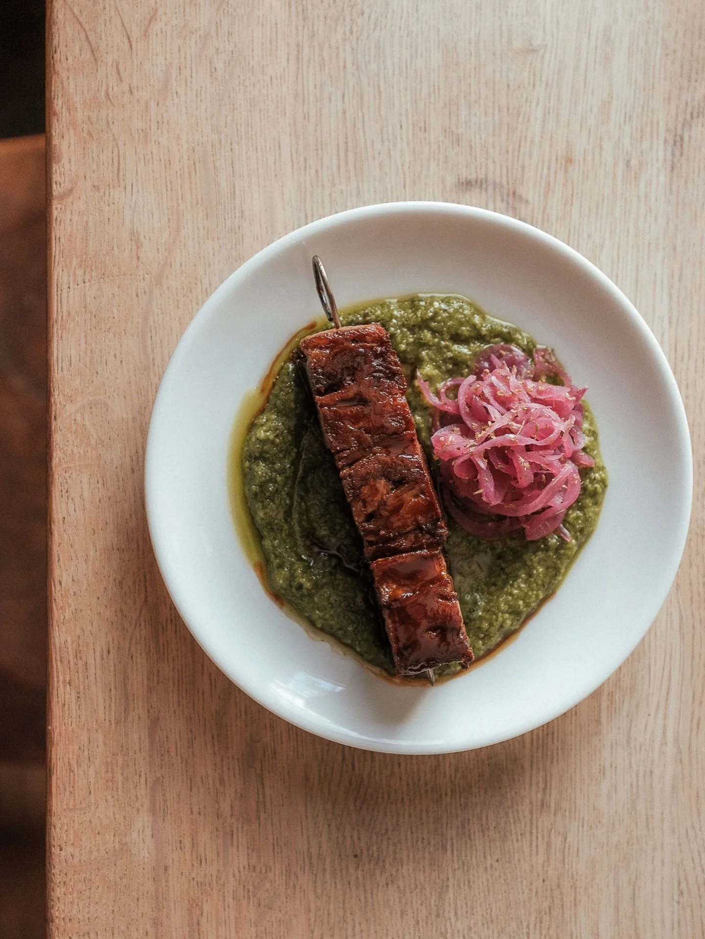 Grilled Lamb Belly Skewer, Salsa Verde, Pickled Onions

One of the standout small plates on the menu currently!