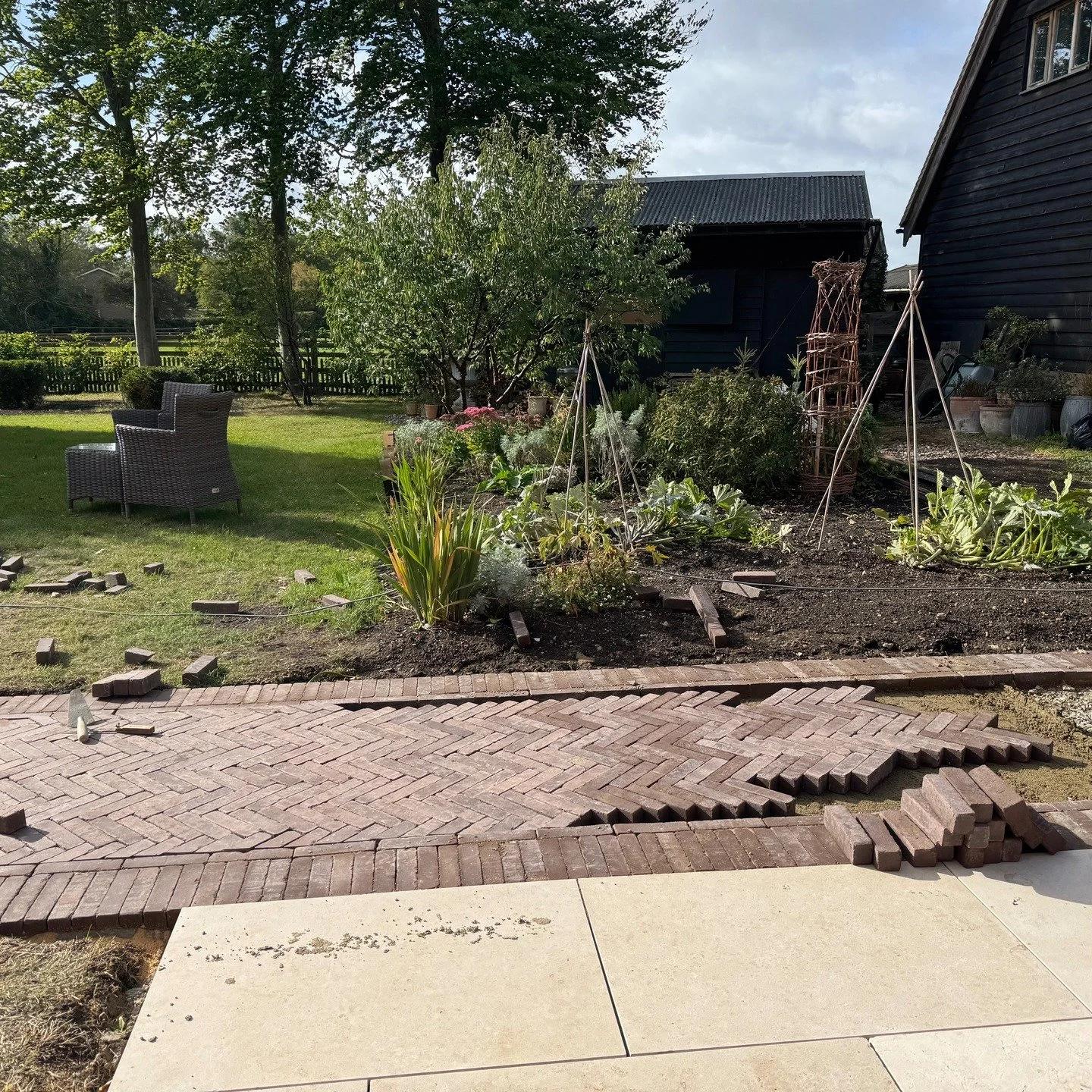Another stage in the process. Pavers going down. Herringbone laid to 45&ordm; creates a traditional style path that almost looks like it's always been there. Beautiful work being done today. (ignore the veg patch behind!) #construction #claypavers #l