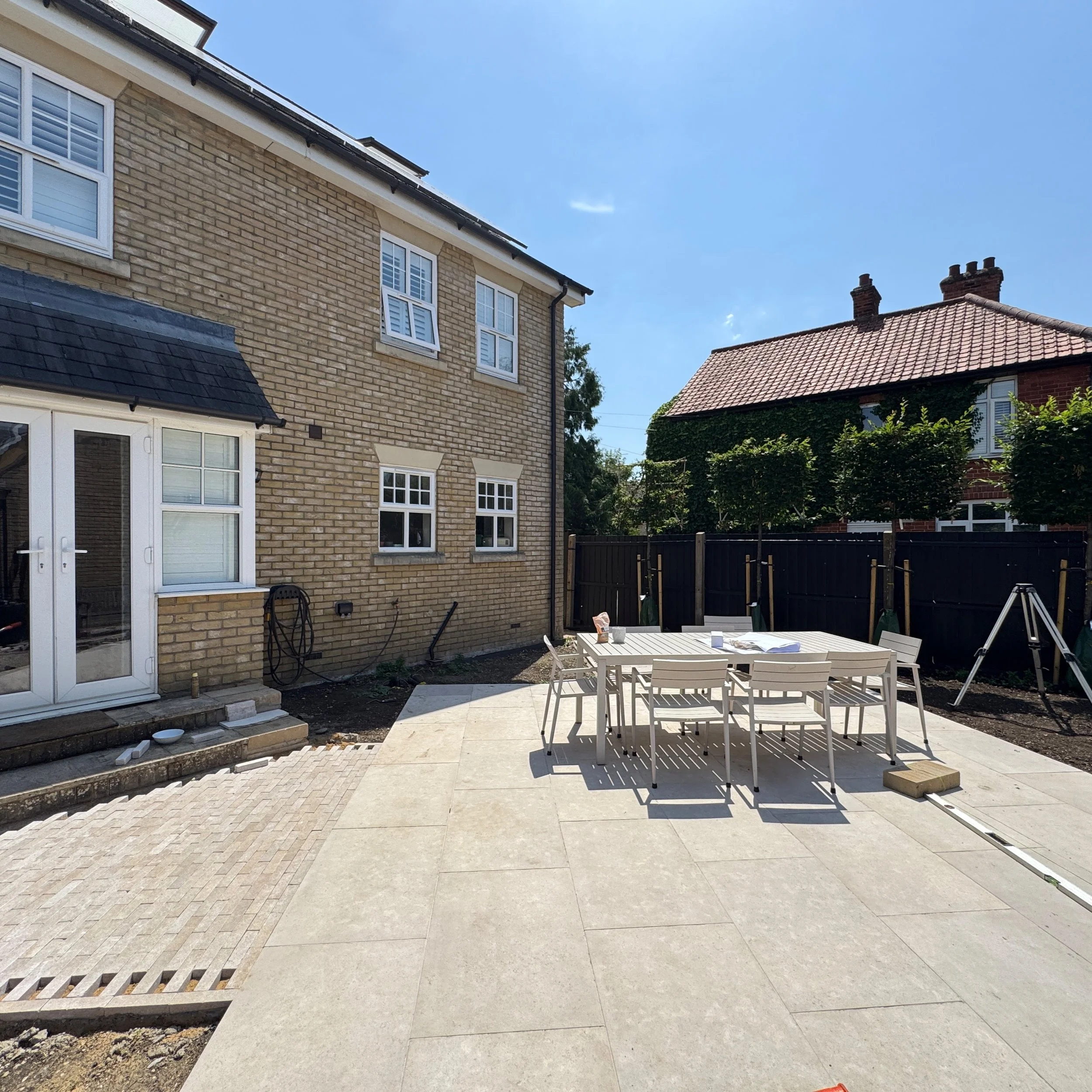 Nick is doing some truly wonderful work in the heat today in Ely. Each time I visit I can't get over how transformative the space is for the client. The limestone really lifts the space and for contrast there's a herringbone section using 'Triton' pa
