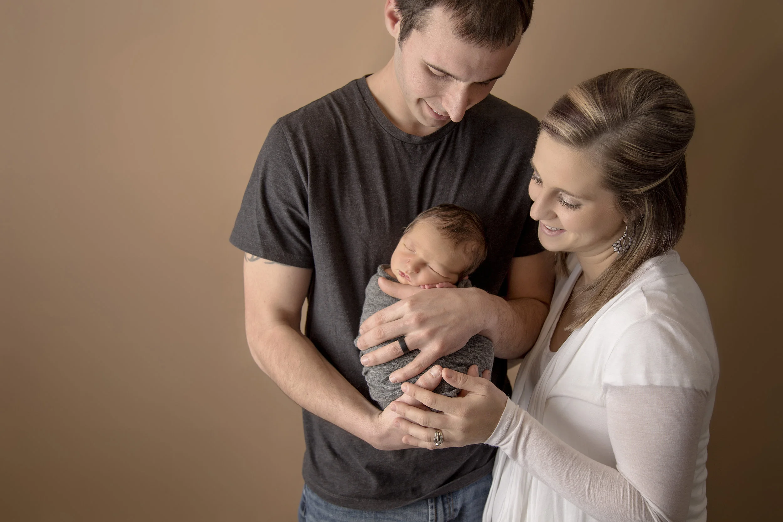 I love this shot from Cooper's newborn session. He is the third child for these two and I love seeing the love in their faces for him. It never gets old! 