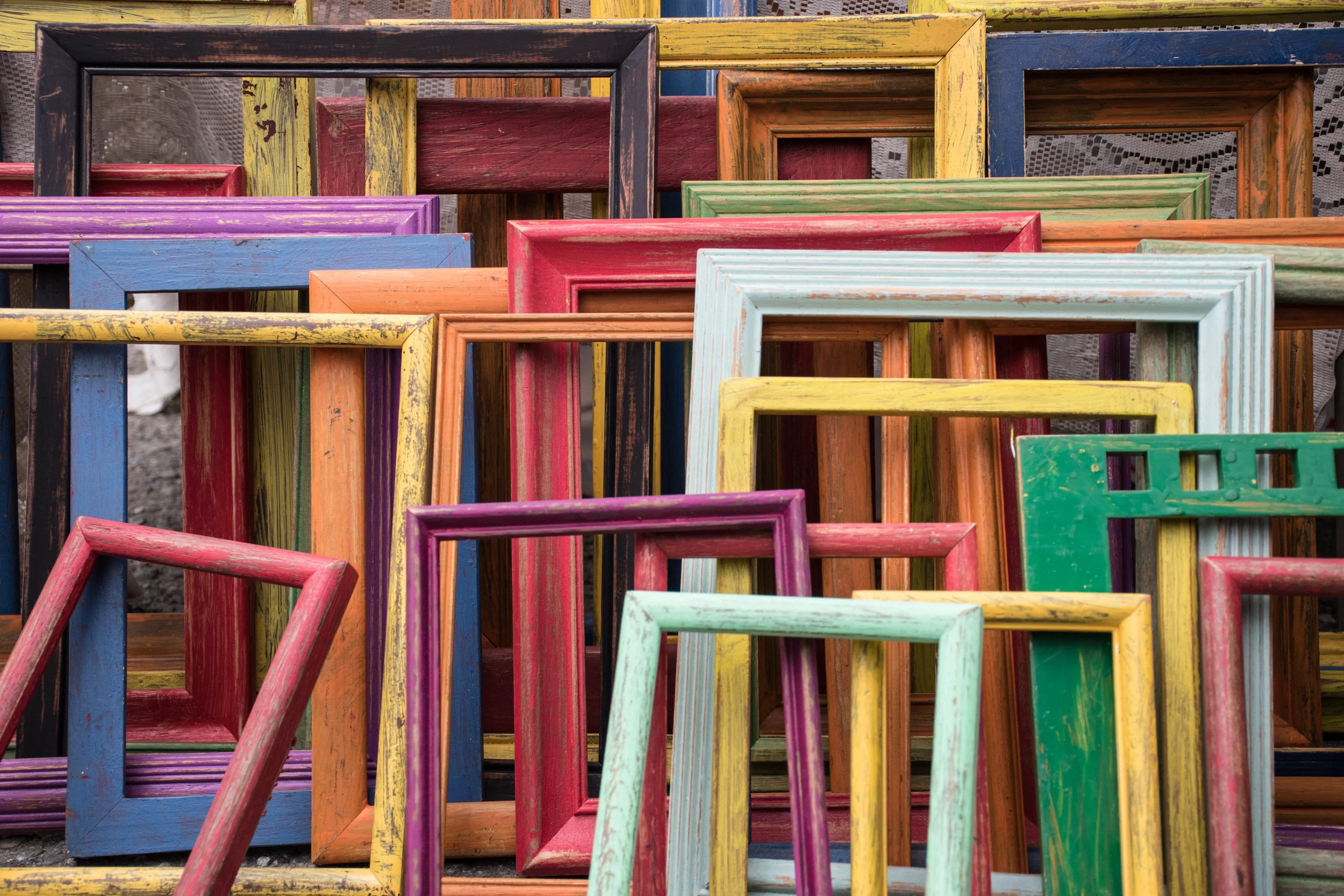 We use wooden frames to make the re-framing more tangible