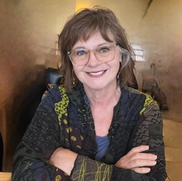 Robin Mullins as "Kitty"