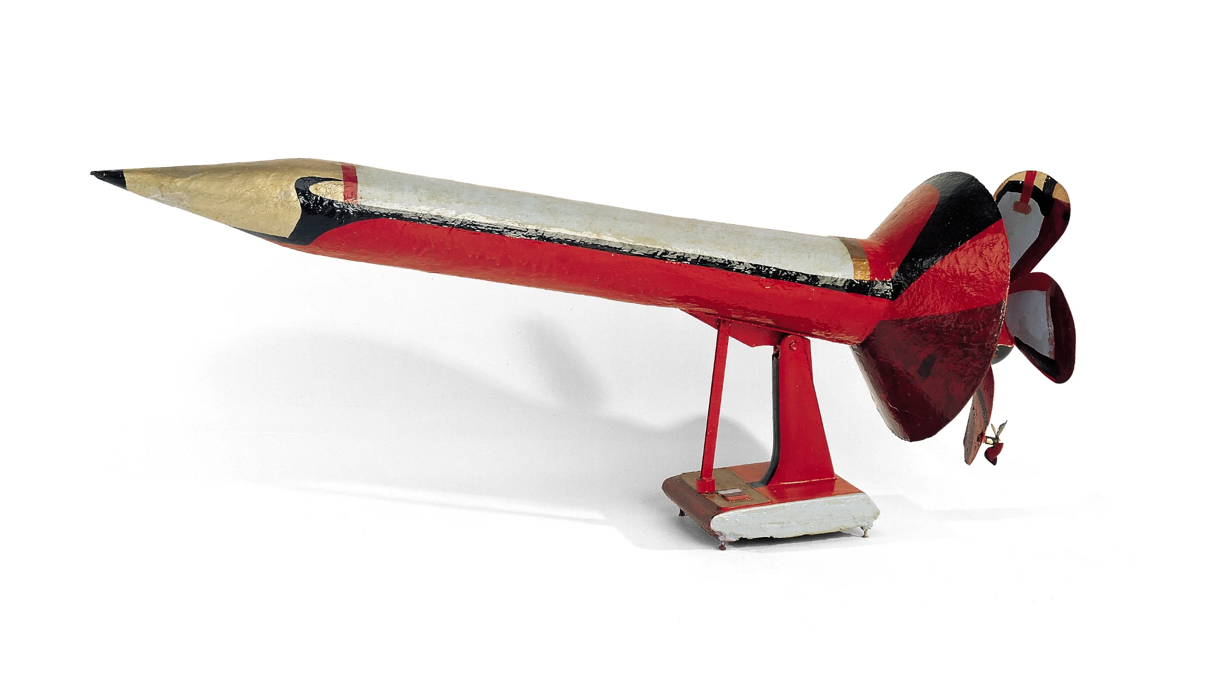 Charles Williams, Pencil Rocket, early 1980s, papier-mâché, plastic fan blade, table-fan base, plastic, doorstop, and paint, 24.25 x 59 x 19 inches