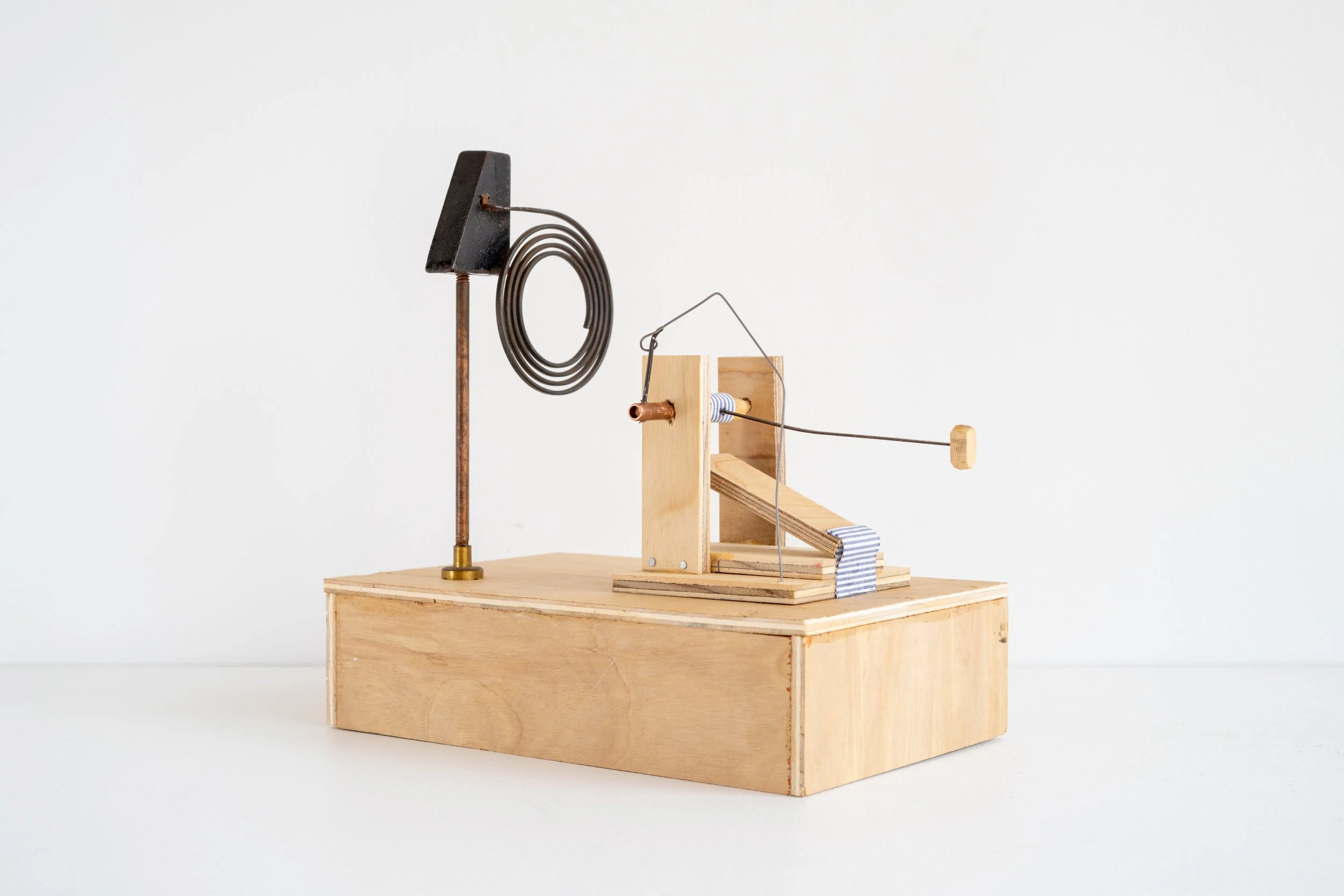 Eric Oglander, Keeper of any time, 2025, plywood, fabric from button down shirt, pine, copper, wire, nails, chime from antique clock, street sweeper bristle, 9 ⅜ x 8 ½ x 5 ⅜ inches
