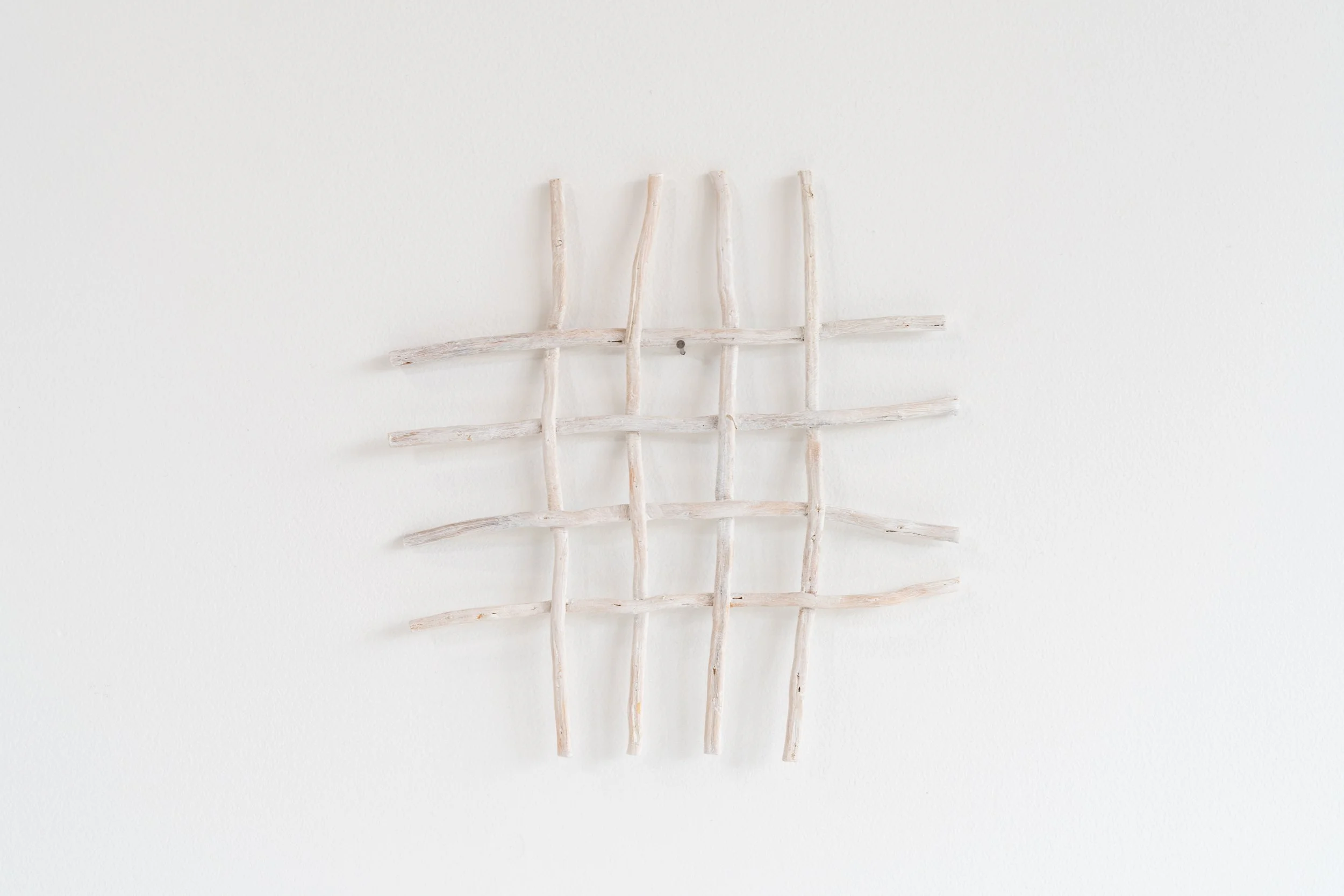 Eric Oglander, Nine Squares, 2022, spruce roots, acrylic paint, glue, 7 x 7 ½ inches
