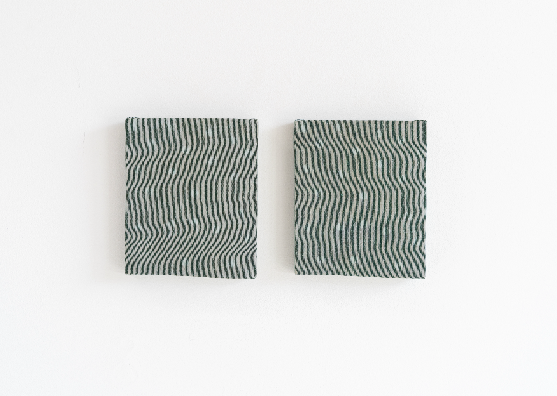 Eric Oglander, One of these things is not like the other, 2025, plywood, fabric from button down shirt, epoxy, beeswax, 4 ¼ x 5 ¼ inches each