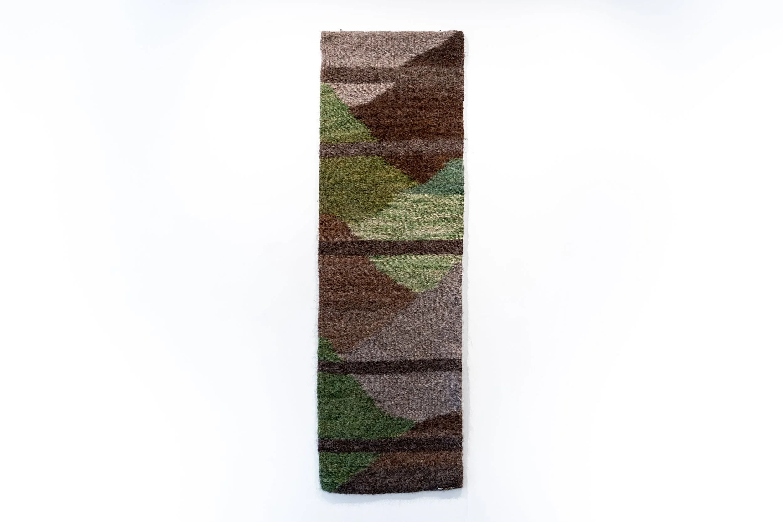 Dobree Adams, SADO, 2011. Handwoven, handspun natural colored and handpainted wool yarn, 74 x 24 inches.