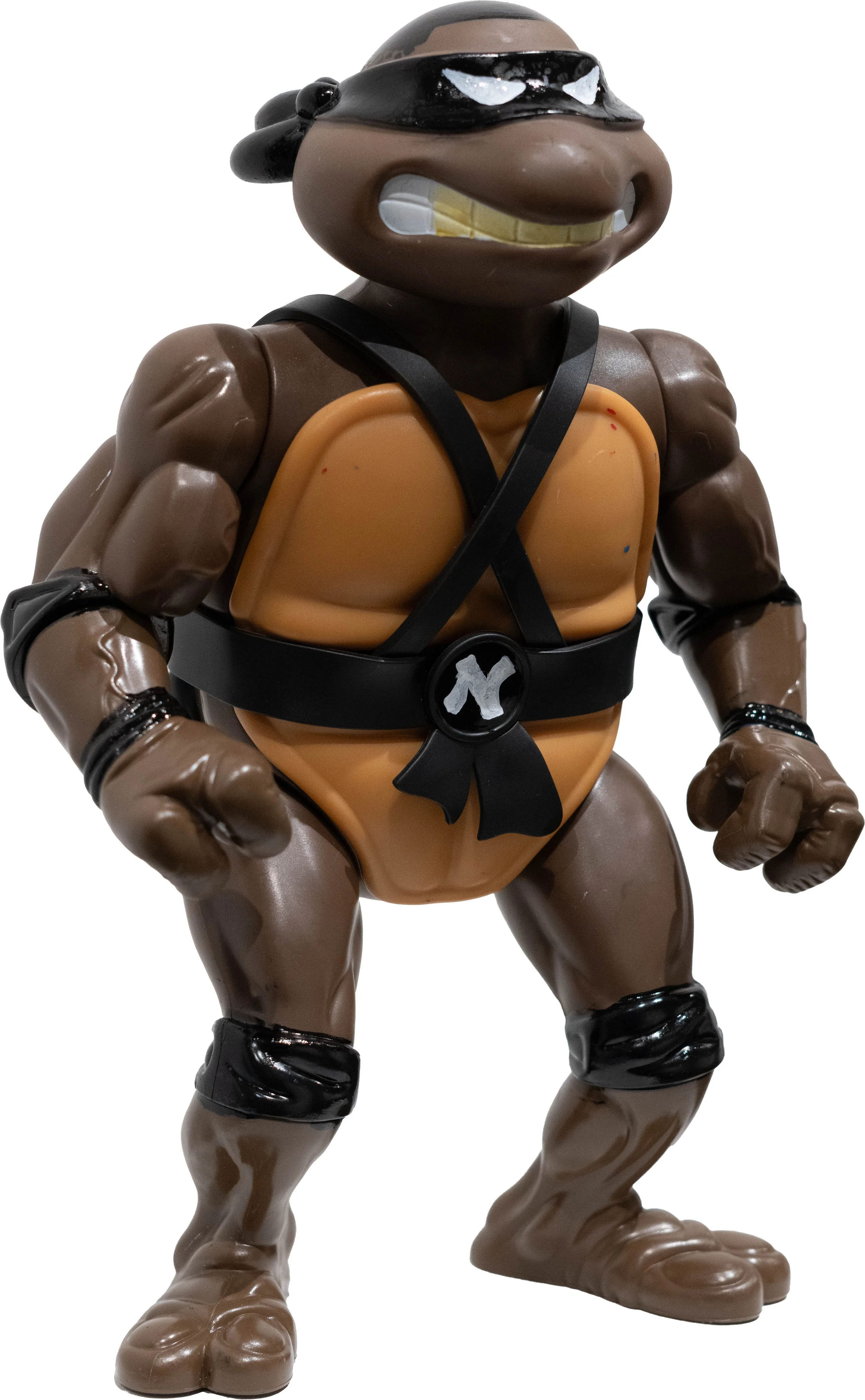 FRKO,Nigga Turtle, 2026, oil sharpie on found object, 8 x 11 ¾ x 5 inches