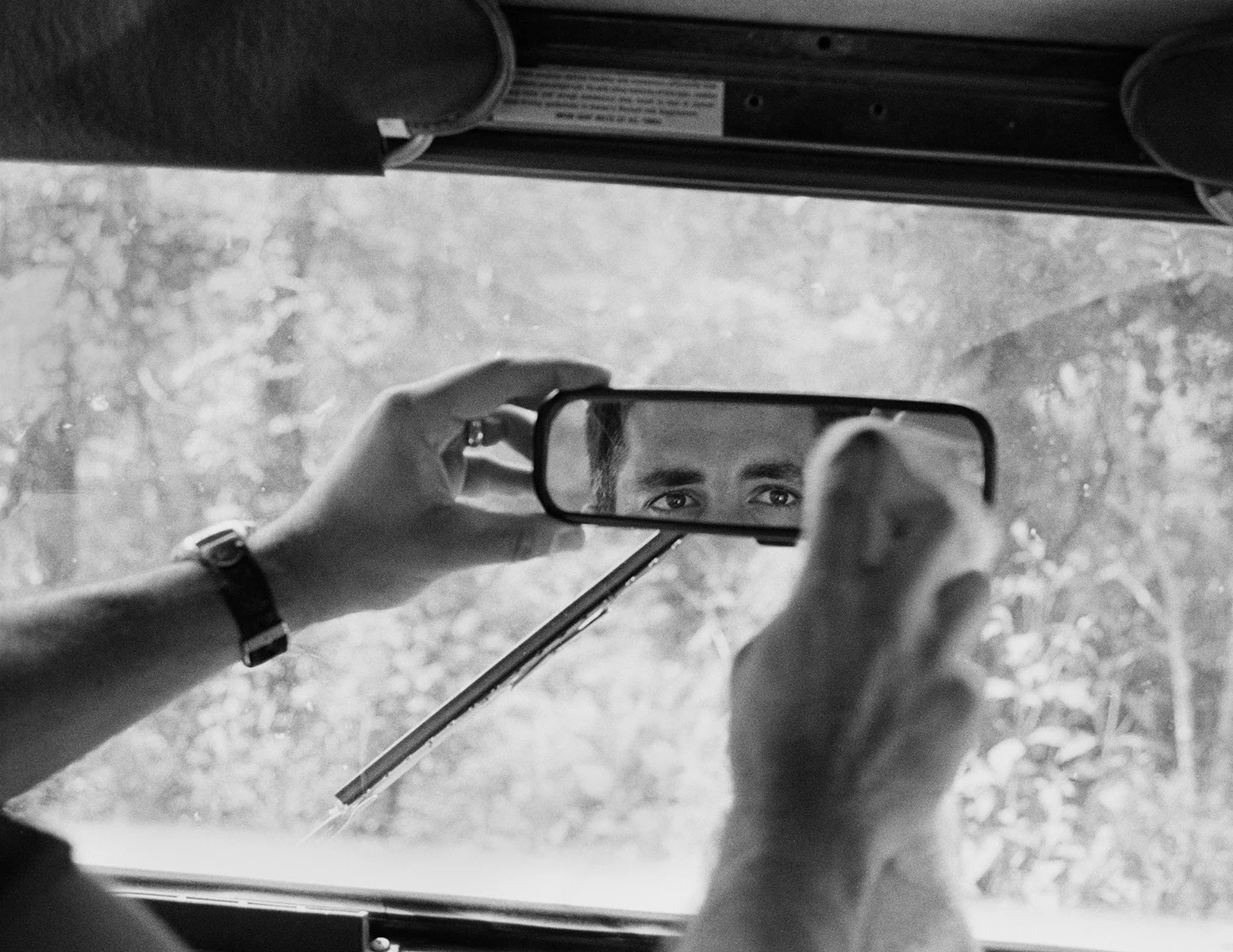 Greg Reynolds, Brian looking in his Jeep’s Mirror, Kentucky, 2026, archival Inkjet print,  22 x 28½ inches