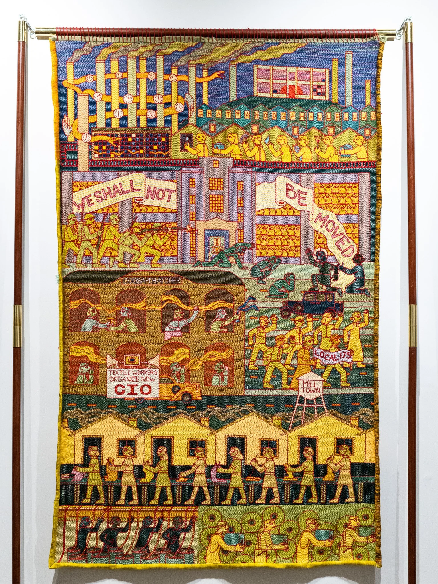 Tabitha Arnold, Mill Town, 2024. Punch needle embroidered wool and cotton yarn on linen cloth, 48 x 7 7¼ inches.