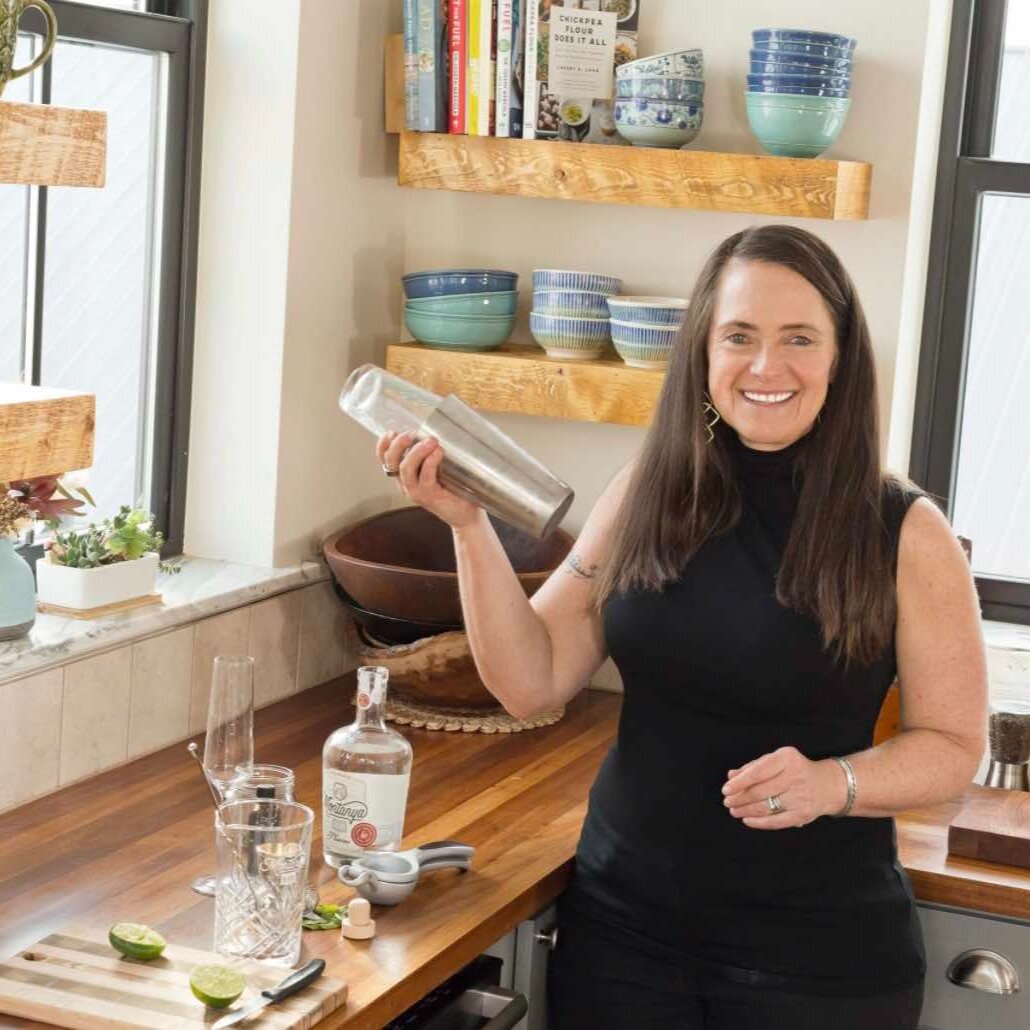Karen Hoskin shakes a cocktail