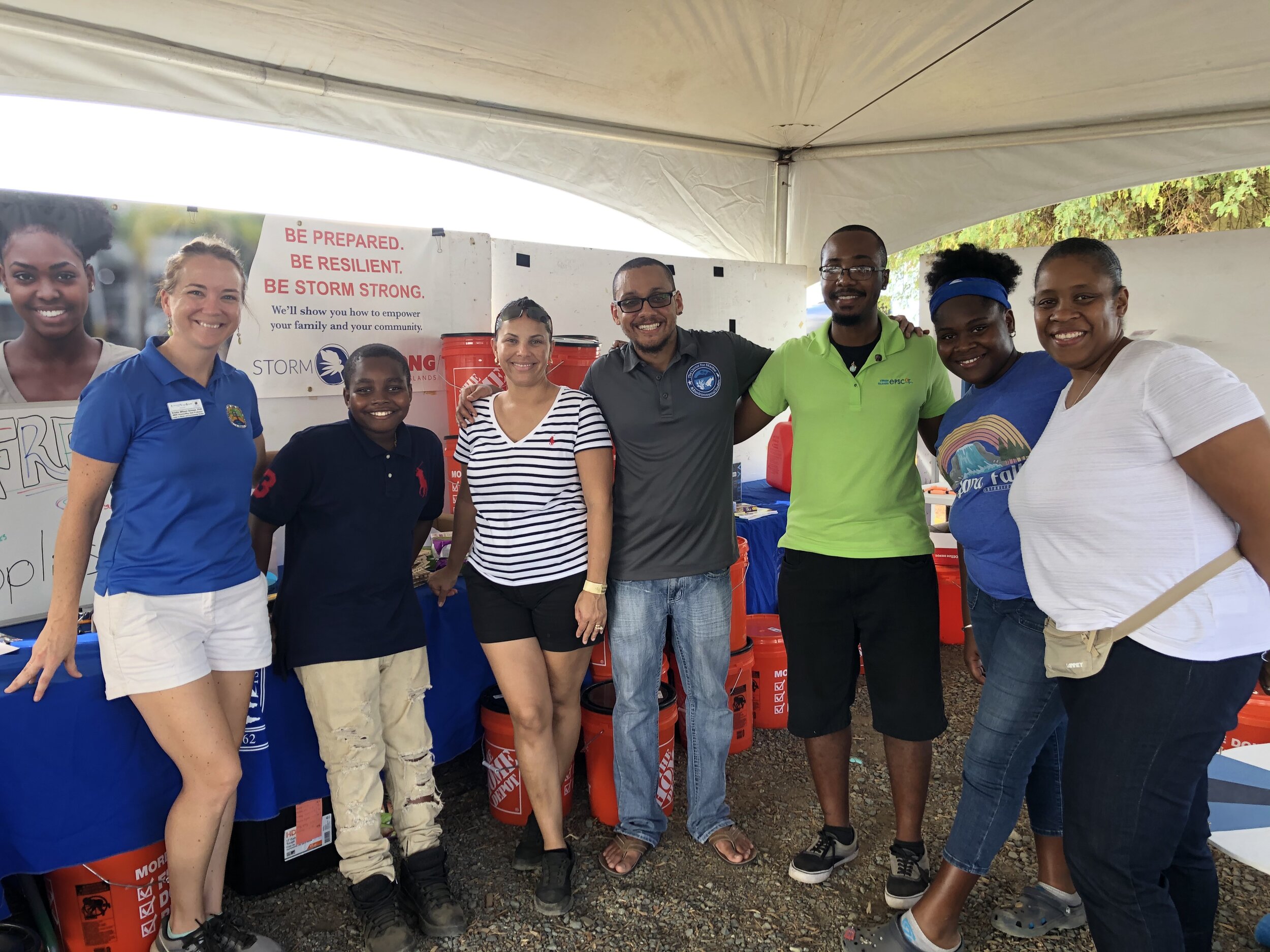   USVI Storm Strong Program participants and project team members who ran the CTP distribution at the 2019 St. Thomas &amp; St. John Agricultural Fair. (From left to right: Kristin Wilson Grimes, Ian Wallen, Jessica LaPlace, Howard Forbes, Jr., Jarvo