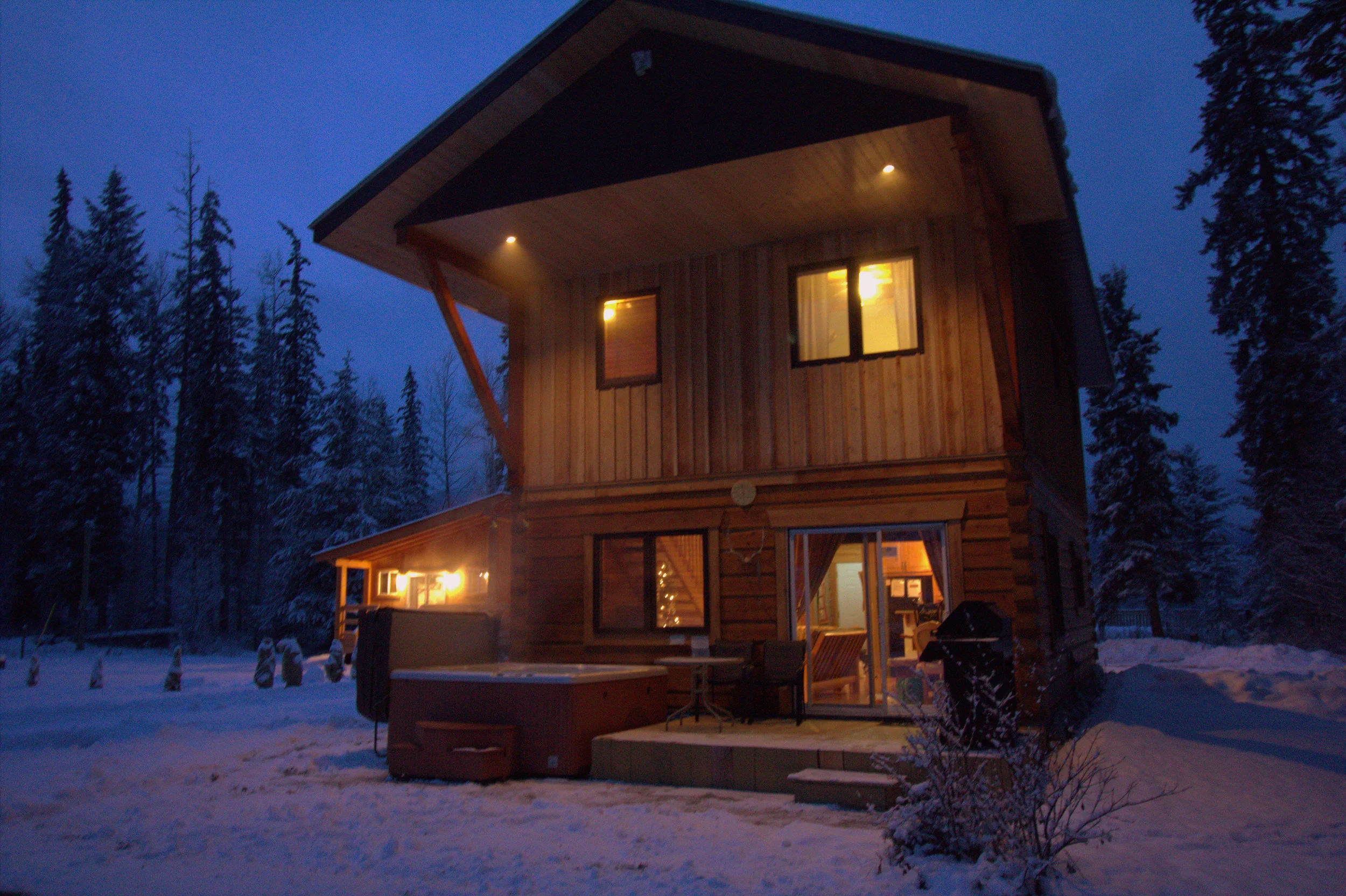 Lodge with hot tub at night.jpg