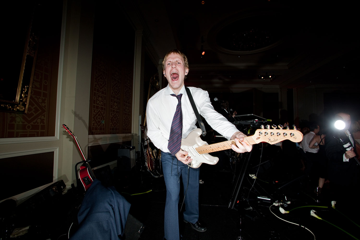 Wedding-Musician-White-Guitar-NY-Times-Andrew-Hetherington.jpg