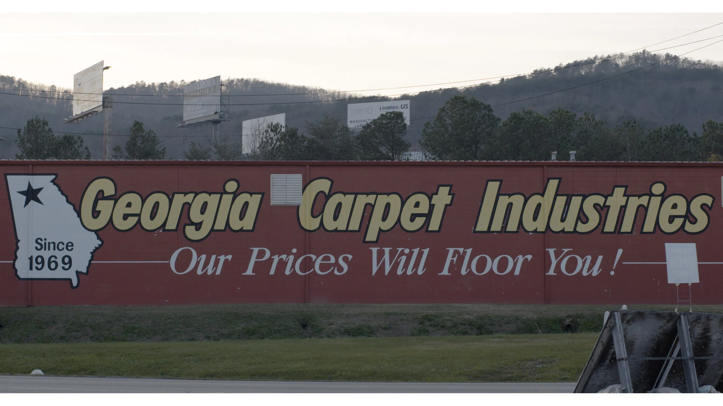 Located in the Carpet Capital of the world—Dalton, Georgia—a Scottish cowboy prepares to move his textile design business to China.