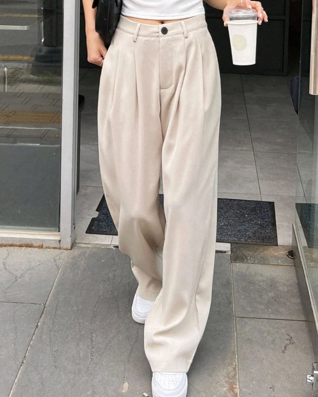 woman wearing trousers