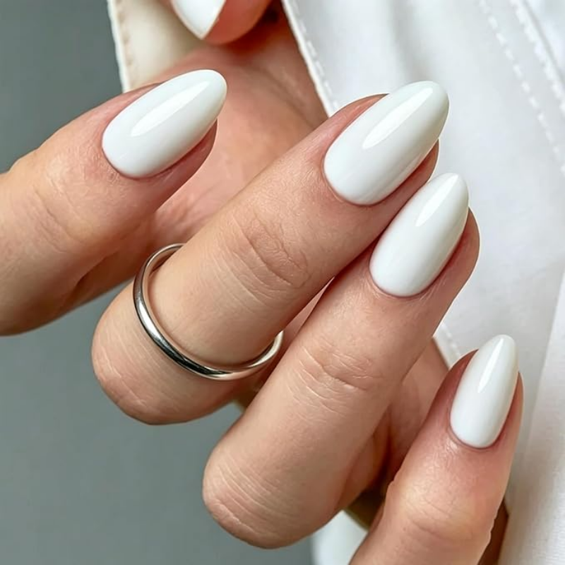 Bright white nails that make your skin look more tan and enhance a sun-kissed glow.