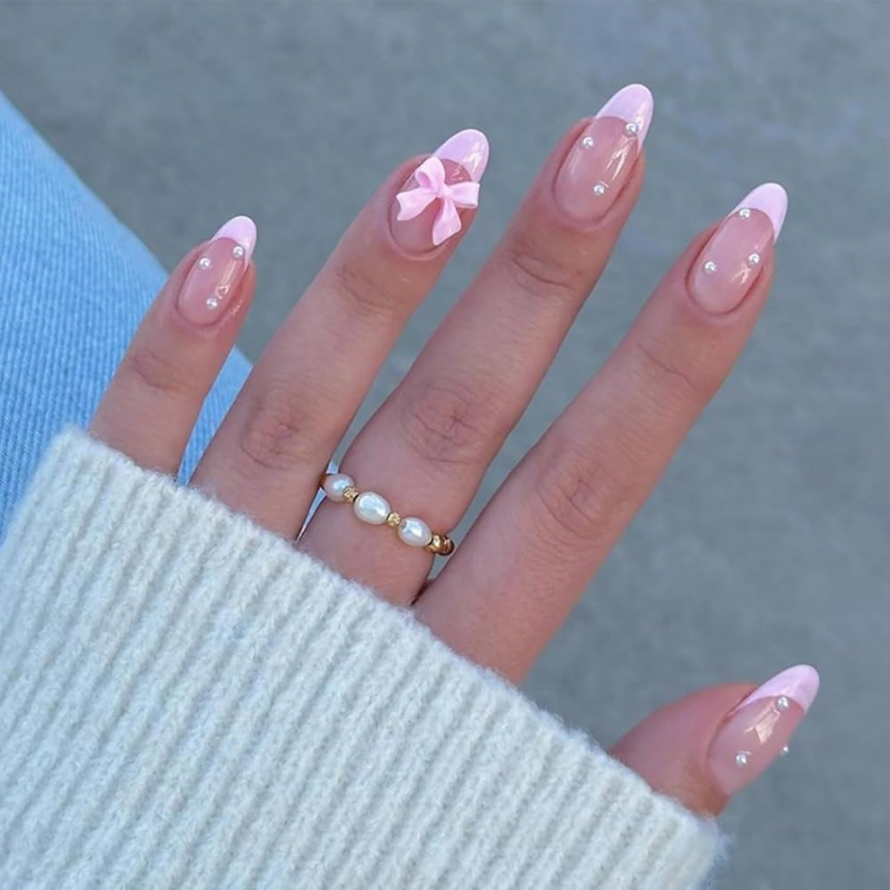 Pink manicure idea featuring the Coquette bow.