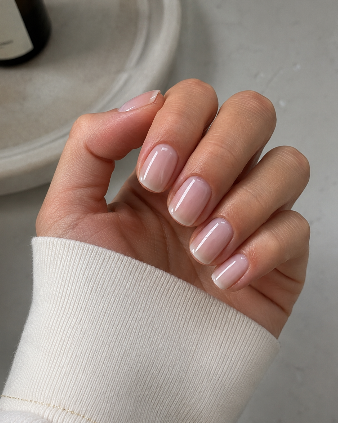 Image featuring the TikTok beauty trend of soap and milky nails.