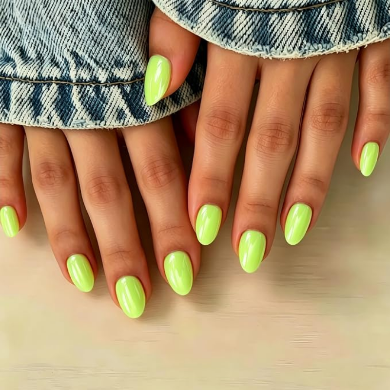 Lime green nails that make your skin look more tan and enhance a sun-kissed glow.