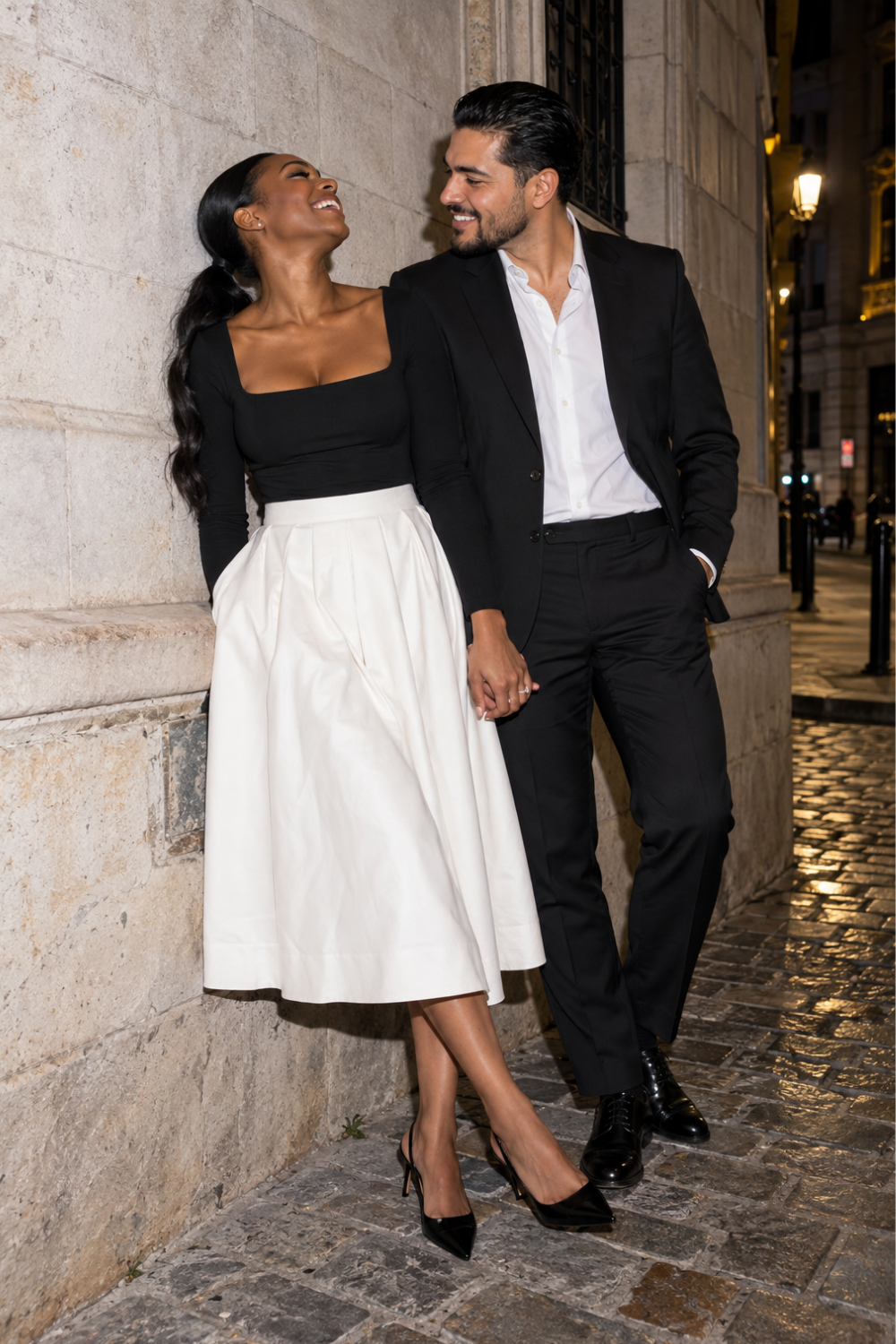 Color & Neutral Engagement Photo Outfit Idea featuring a couple wearing black and white.