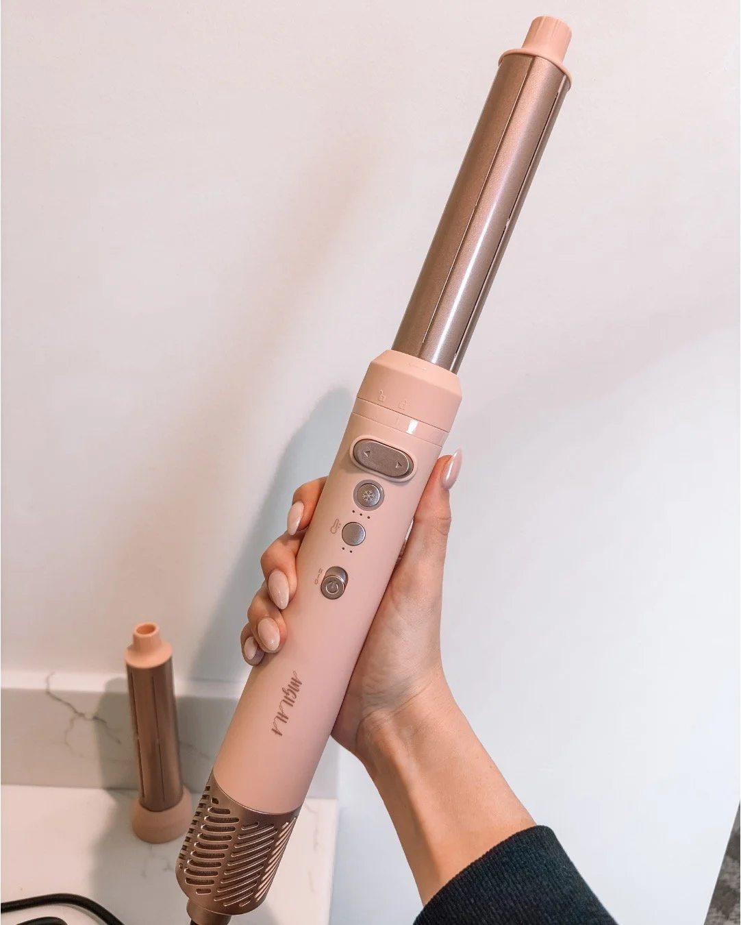 close up of a pink air wrap styler