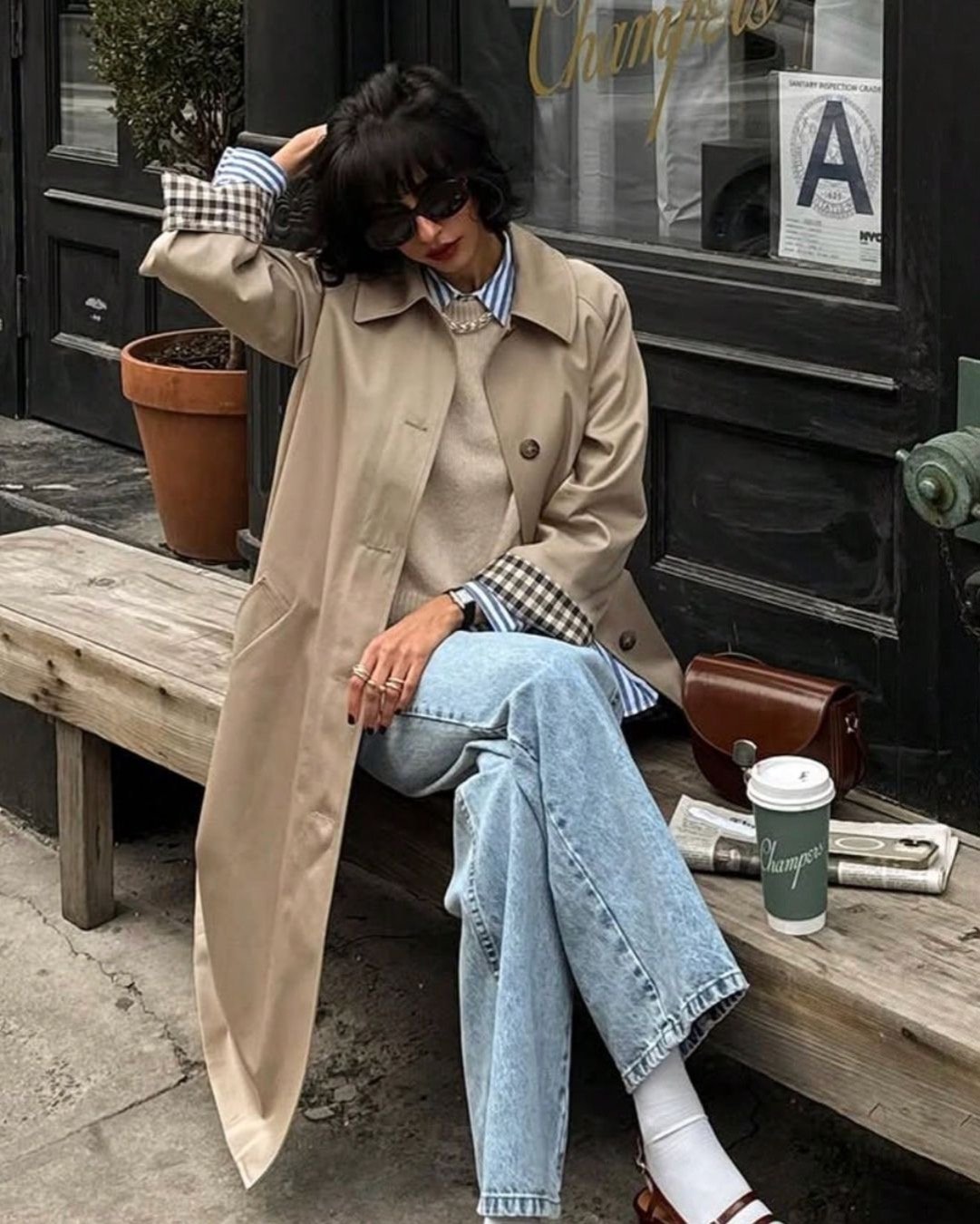 woman wearing a trench coat outfit