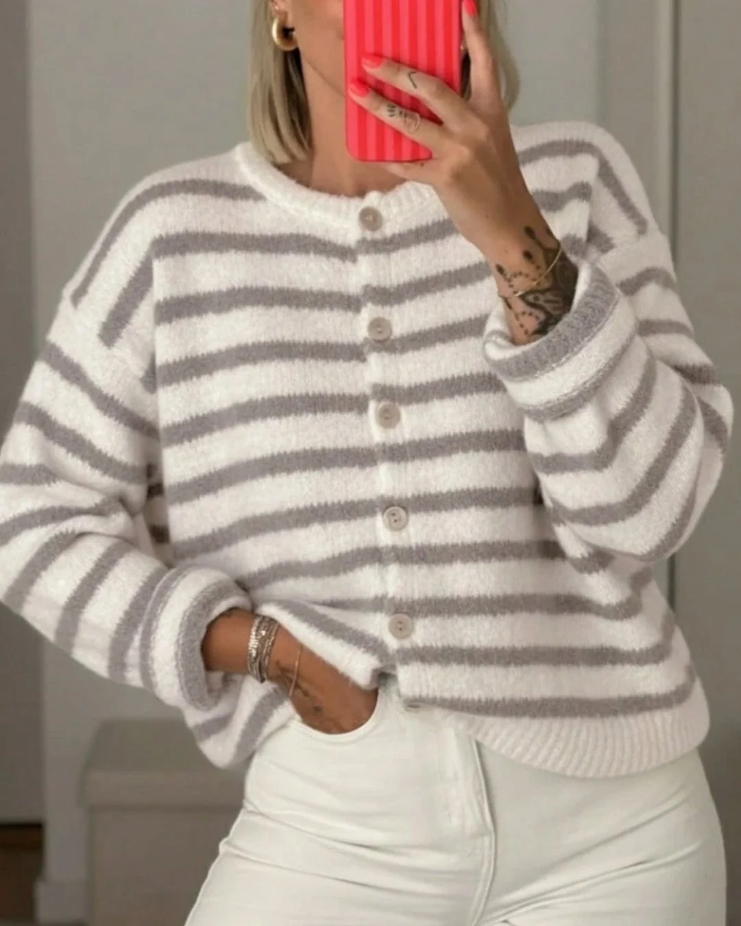 woman wearing a striped cardigan