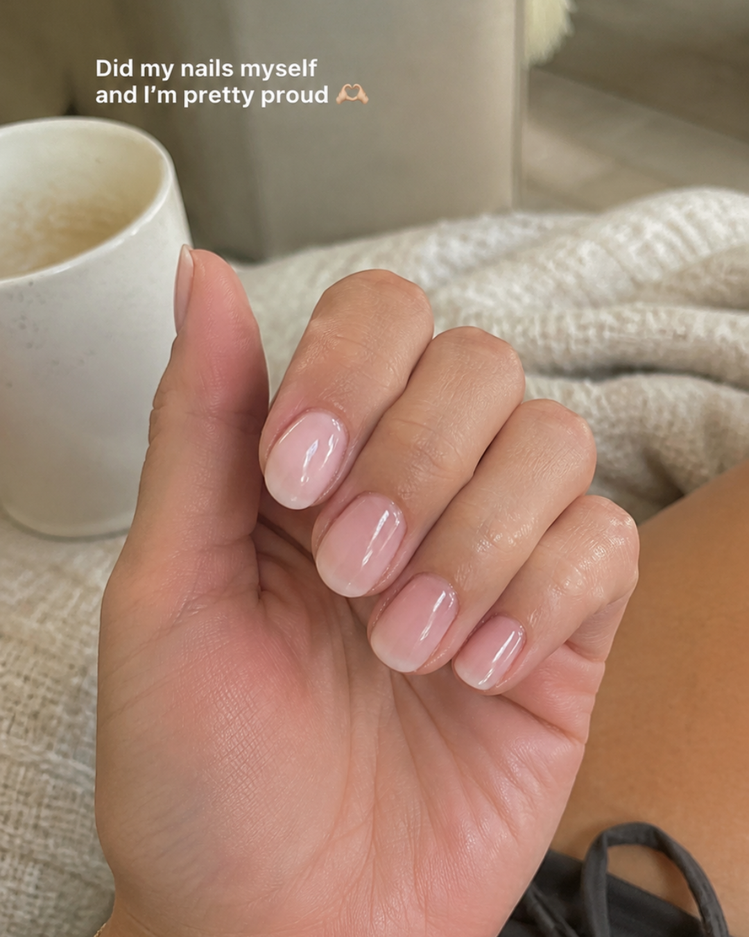 An at-home DIY manaicure featuring short nails with a natural look and the phrase "Did my nails myself and I'm pretty proud"
