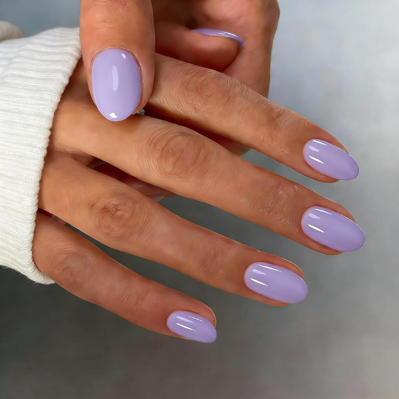 Lavender nails that make your skin look more tan and enhance a sun-kissed glow.
